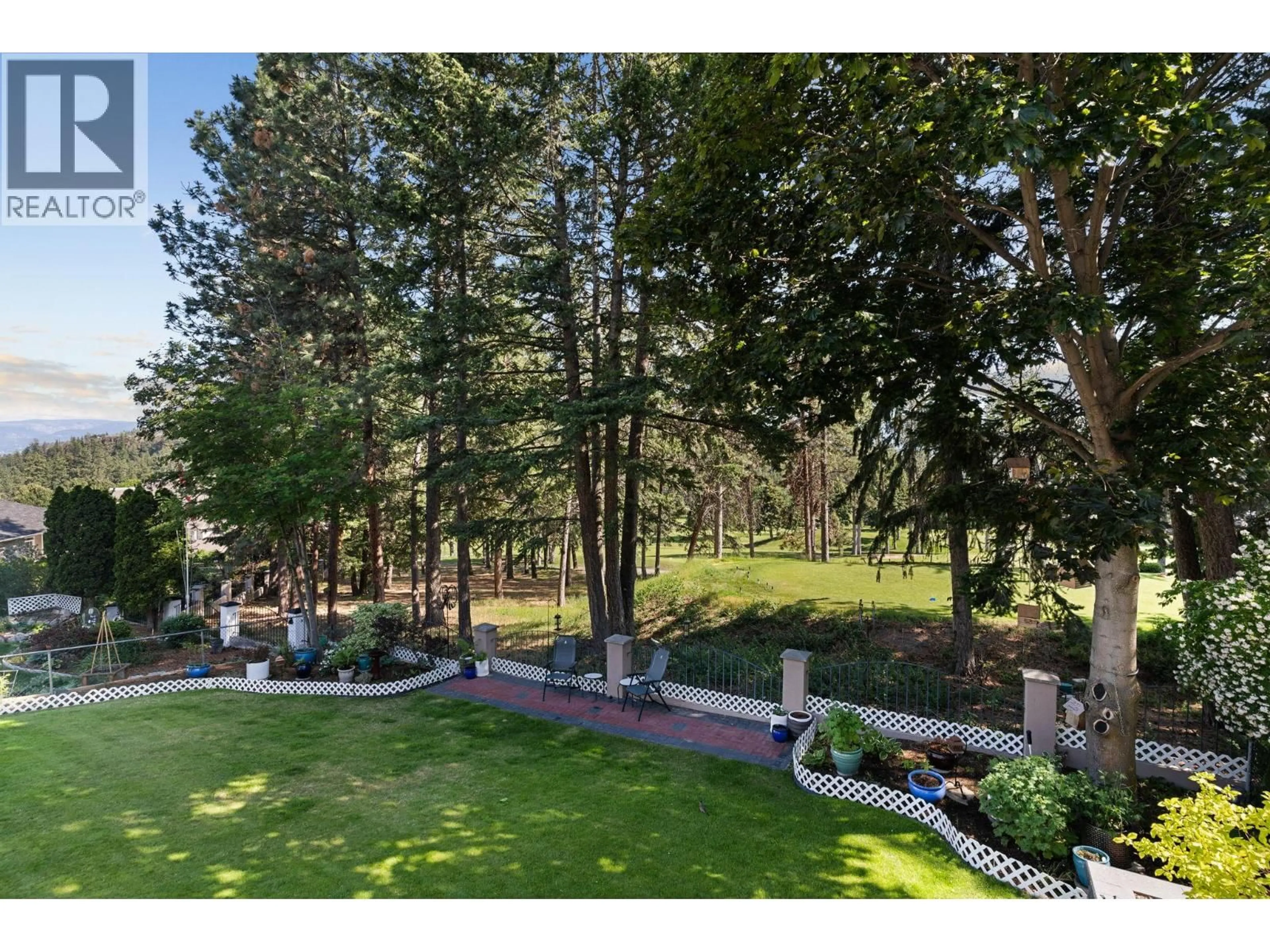 A pic from outside/outdoor area/front of a property/back of a property/a pic from drone, forest/trees view for 2211 SHANNON WOODS PLACE, West Kelowna British Columbia V4T2L9