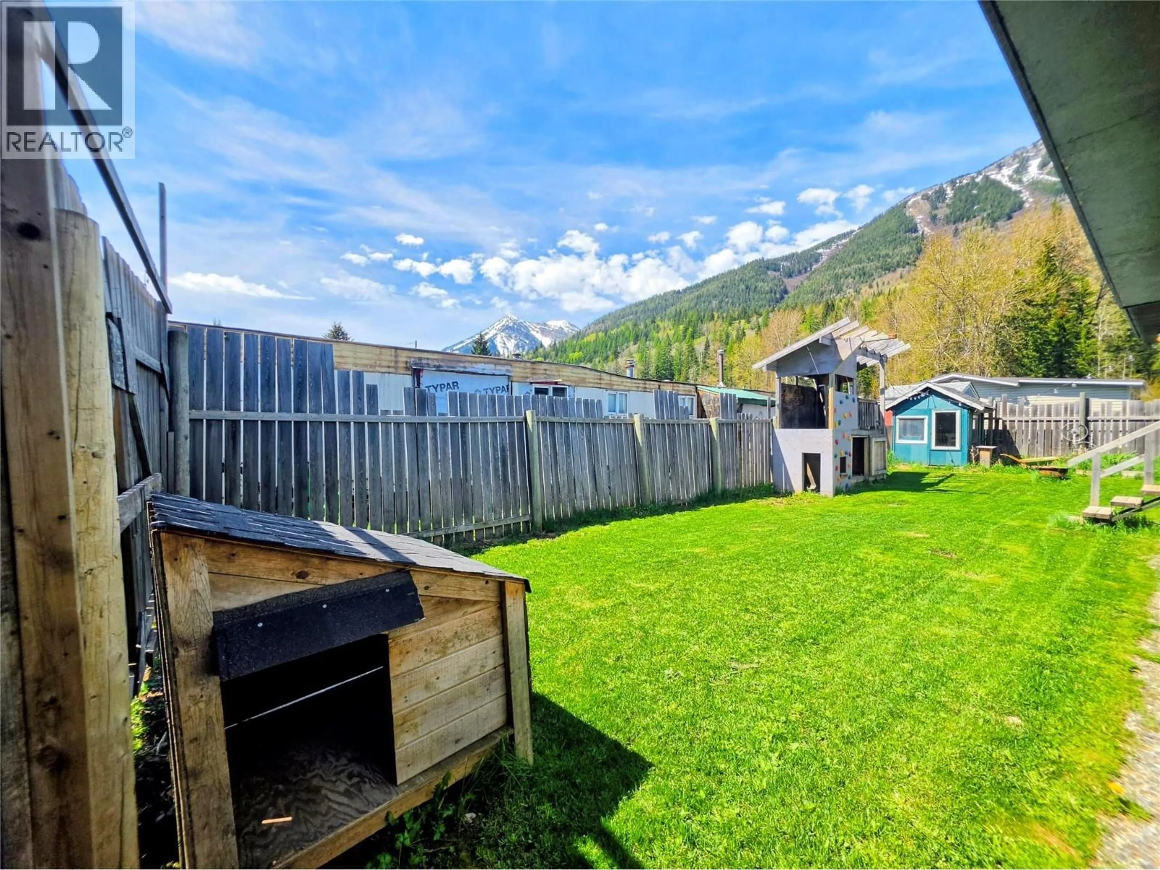 A pic from outside/outdoor area/front of a property/back of a property/a pic from drone, mountain view for 1759 DICKEN ROAD, Fernie British Columbia V0B1M5