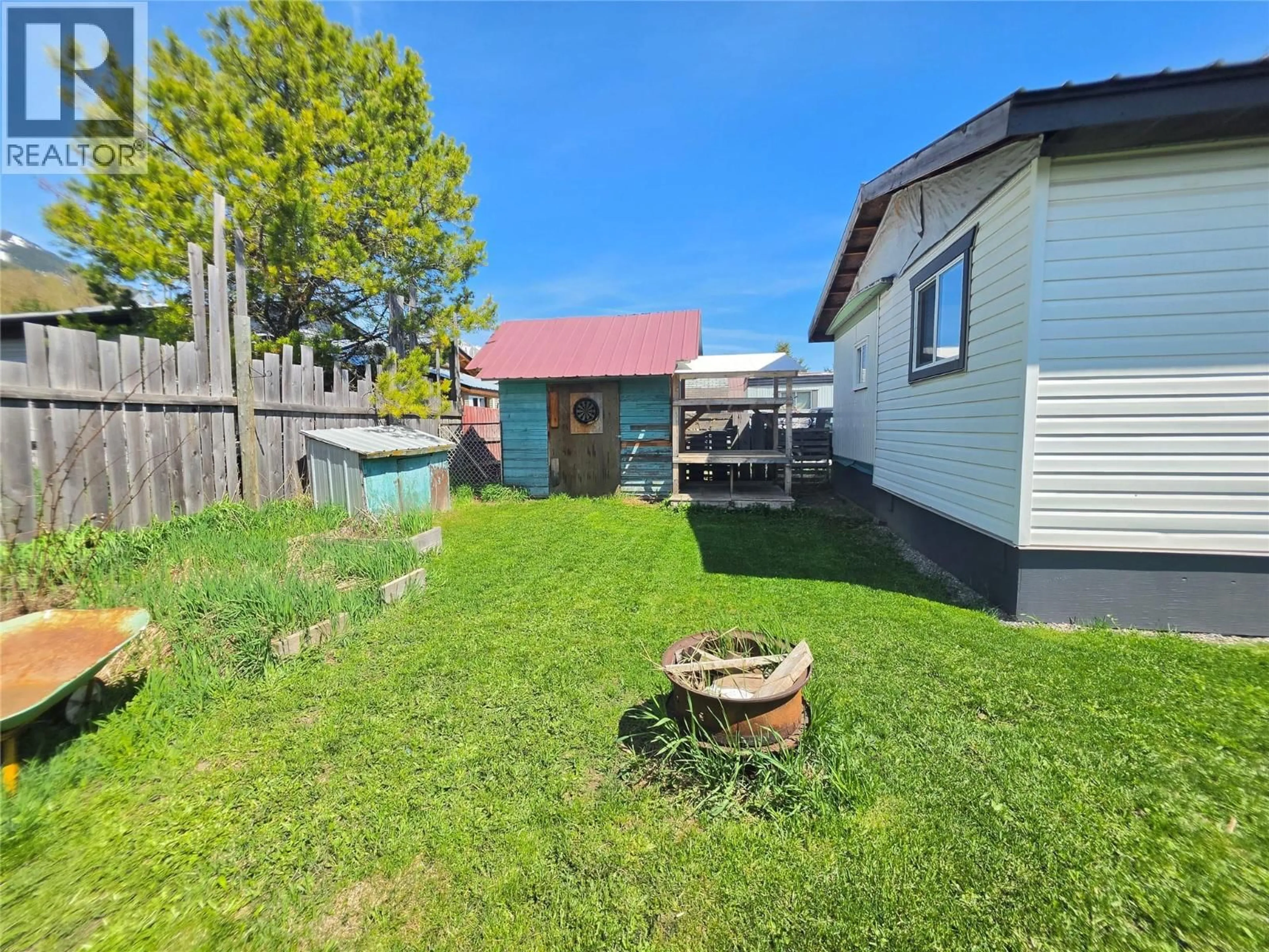 A pic from outside/outdoor area/front of a property/back of a property/a pic from drone, street for 1759 DICKEN ROAD, Fernie British Columbia V0B1M5