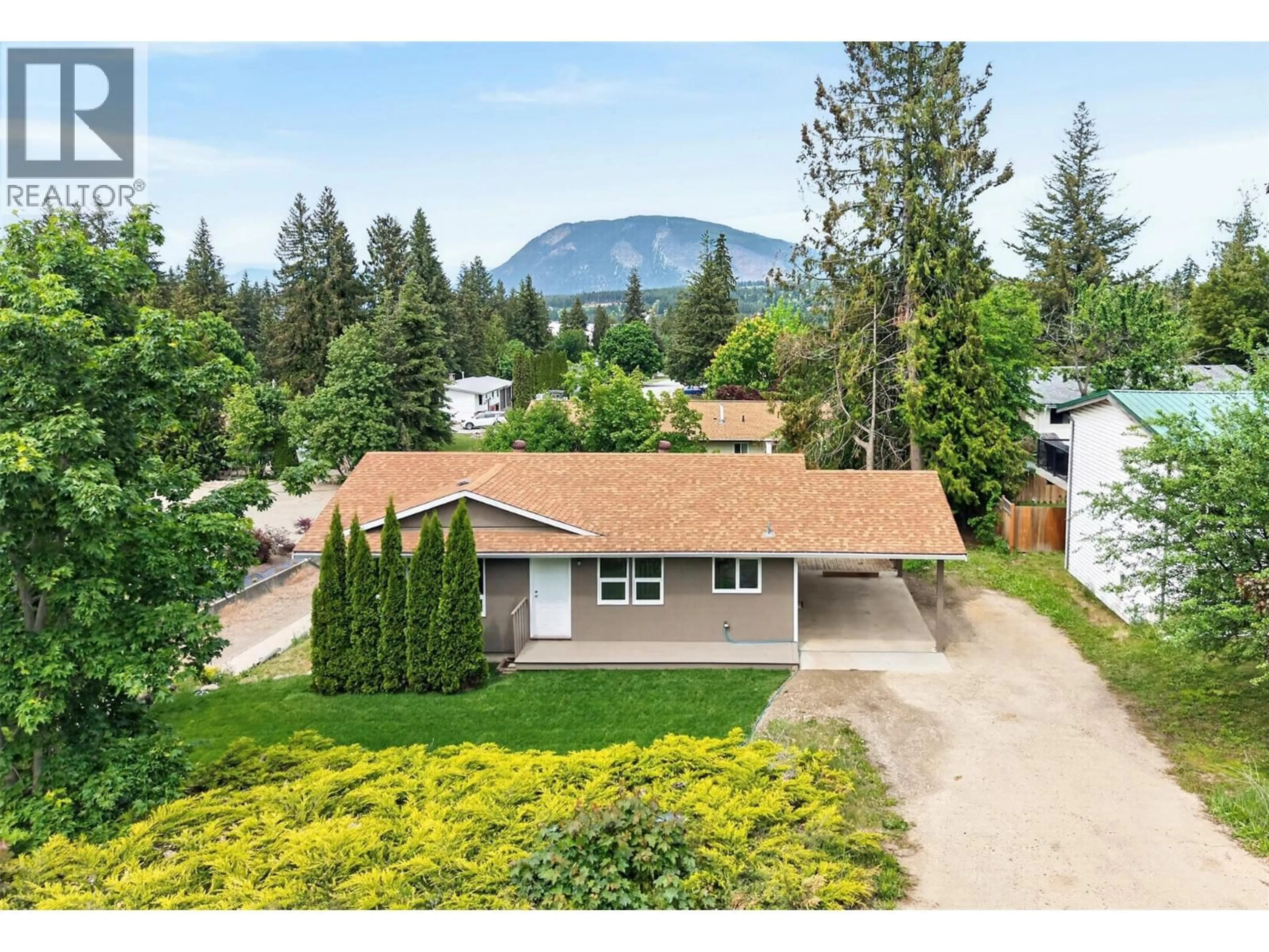 A pic from outside/outdoor area/front of a property/back of a property/a pic from drone, mountain view for 2731 OKANAGAN AVENUE NORTHEAST, Salmon Arm British Columbia V1E2T1