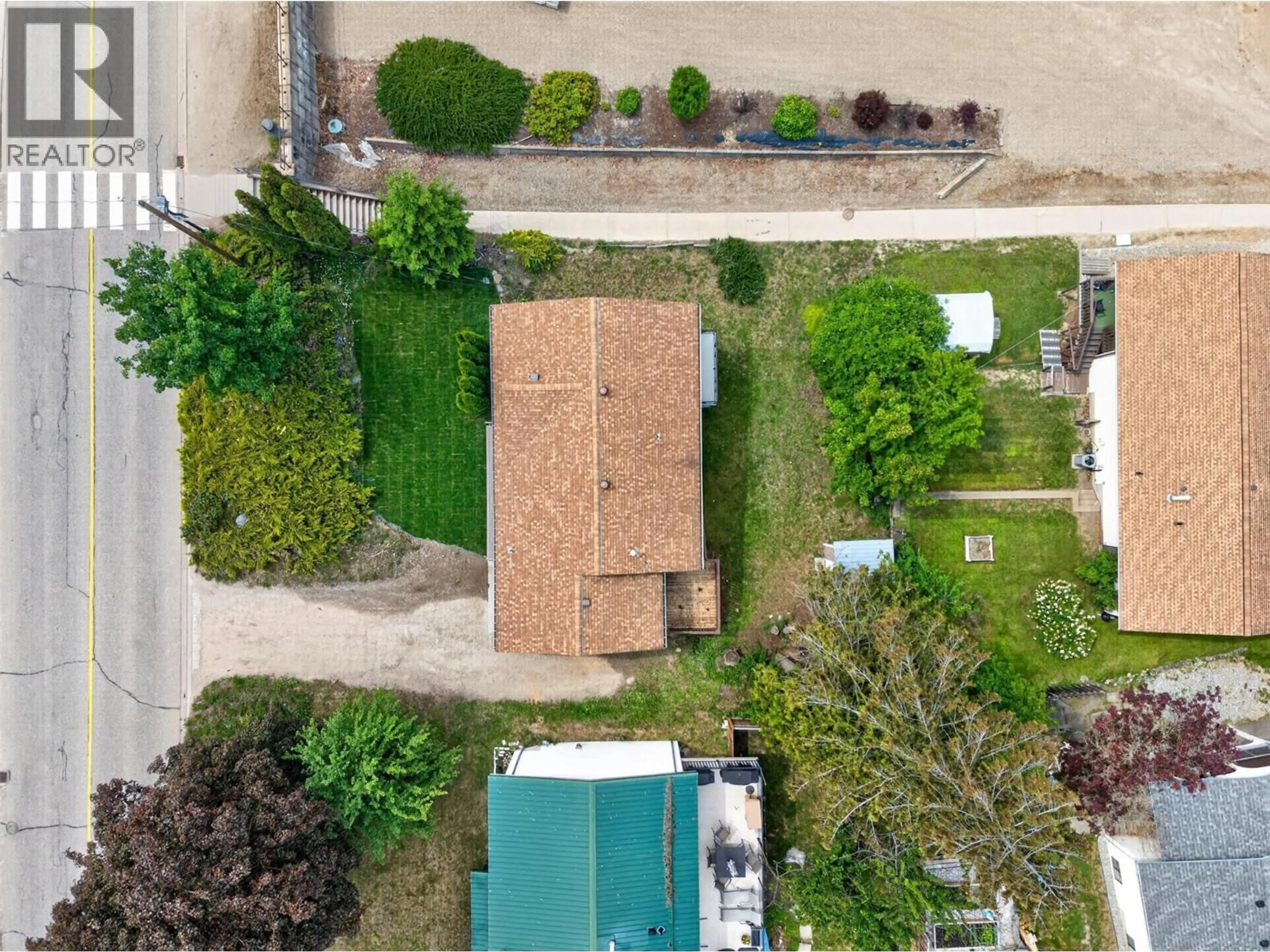 A pic from outside/outdoor area/front of a property/back of a property/a pic from drone, street for 2731 OKANAGAN AVENUE NORTHEAST, Salmon Arm British Columbia V1E2T1