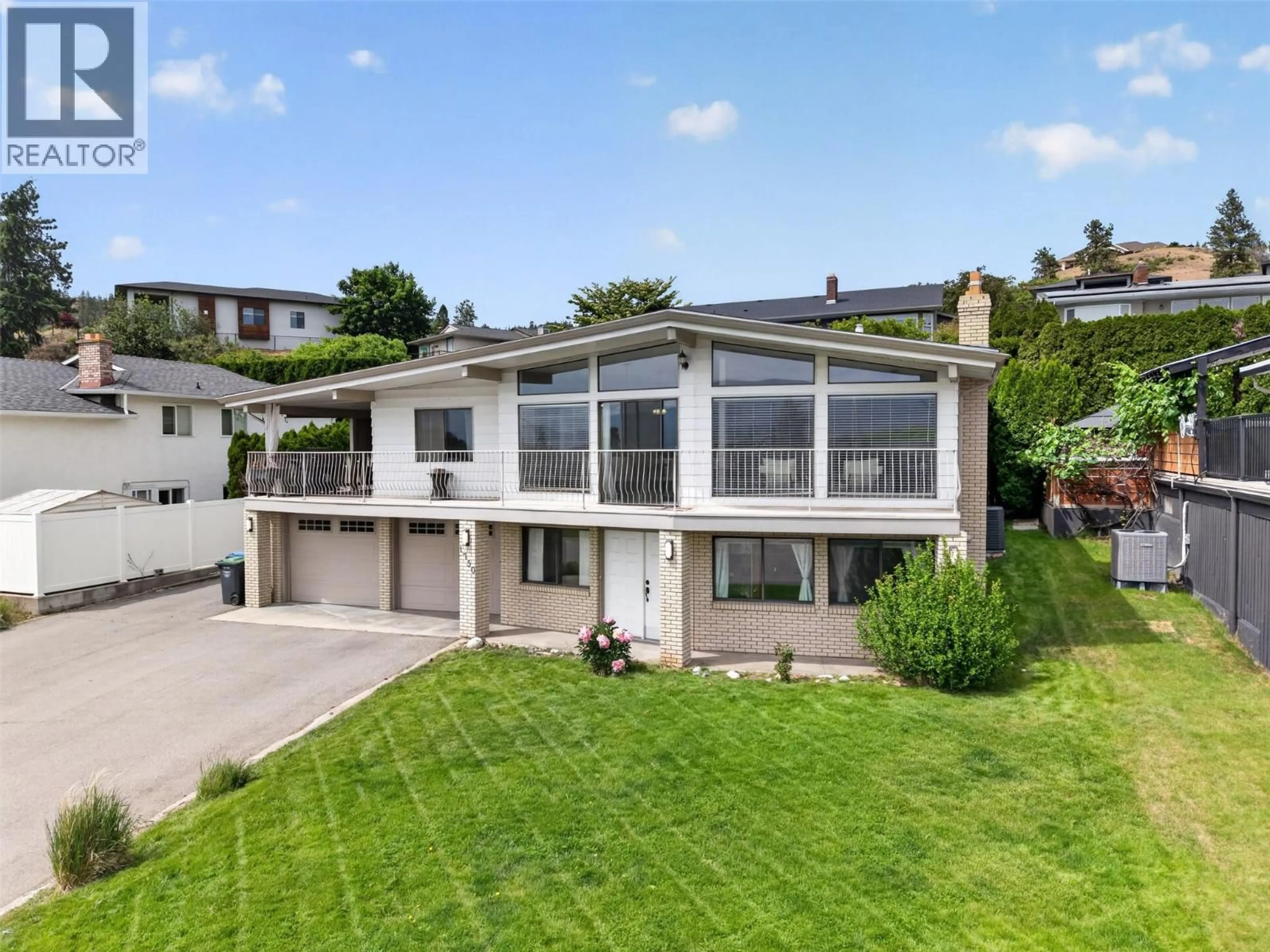 A pic from outside/outdoor area/front of a property/back of a property/a pic from drone, street for 1750 SONORA DRIVE, Kelowna British Columbia V1Y8K7
