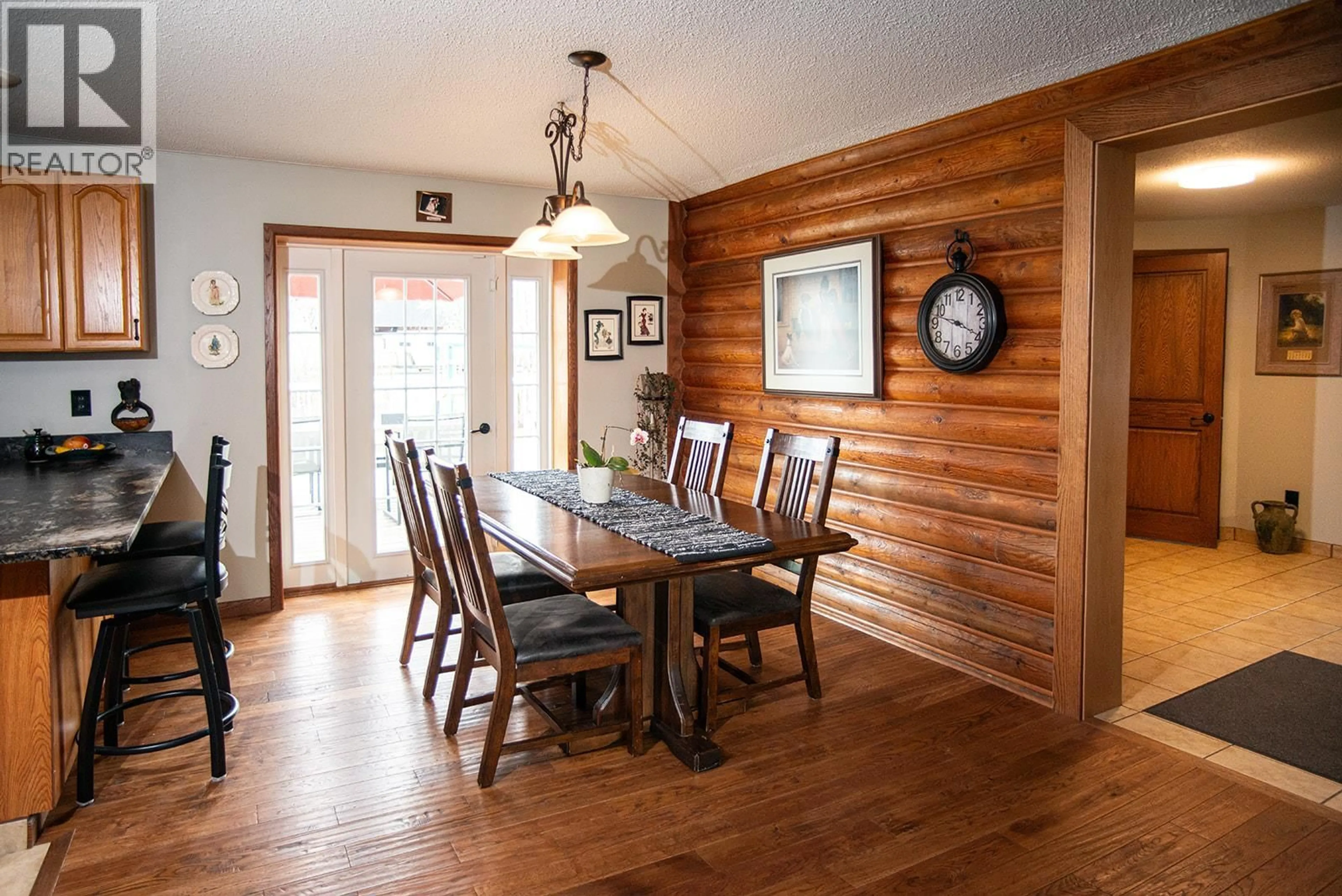 Dining room, wood/laminate floor for 3622-3632 208 ROAD, Dawson Creek British Columbia V1G5A1