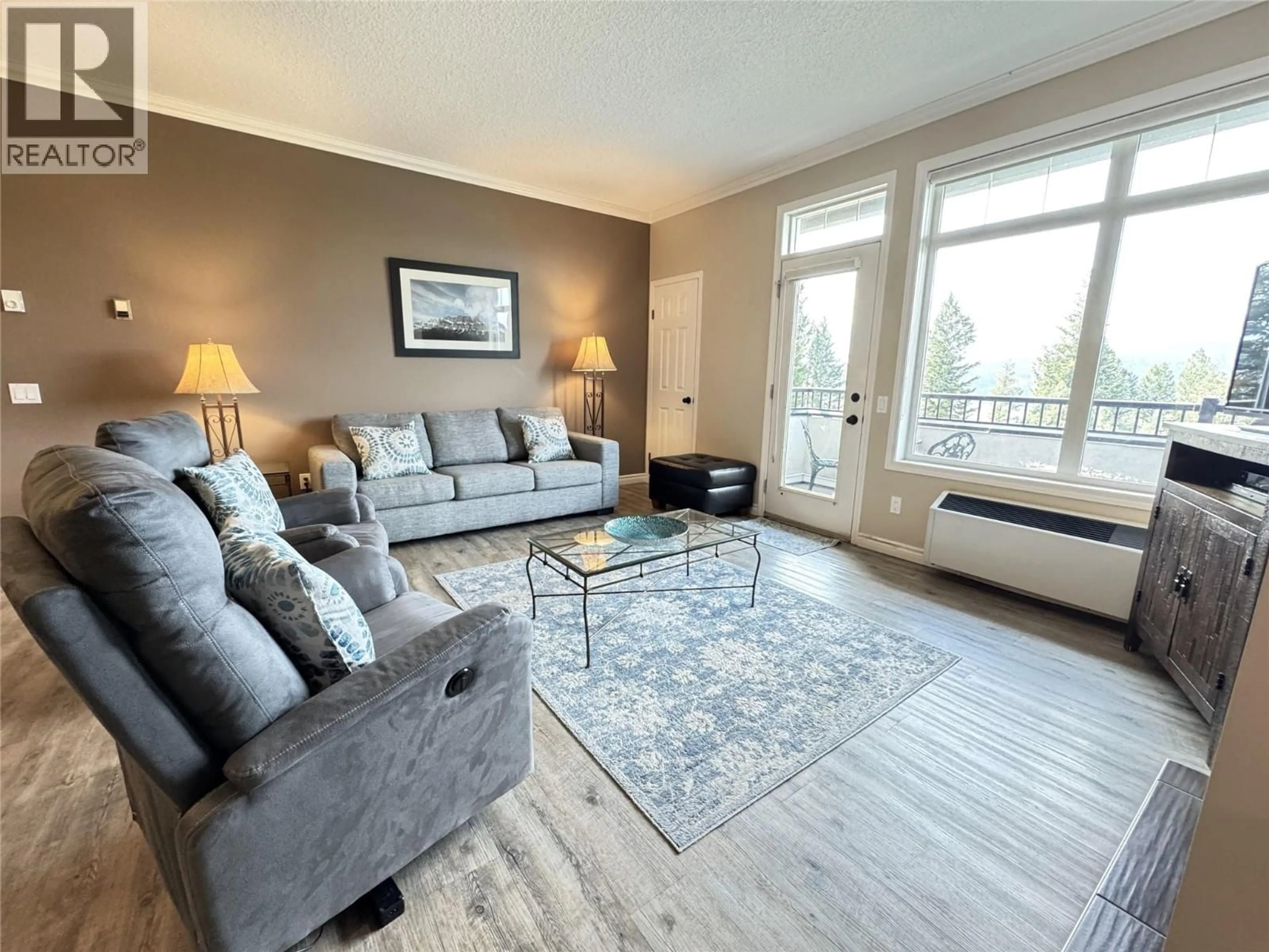 Living room with furniture, unknown for 113 - 100 BIGHORN BOULEVARD, Radium Hot Springs British Columbia V0A1M0