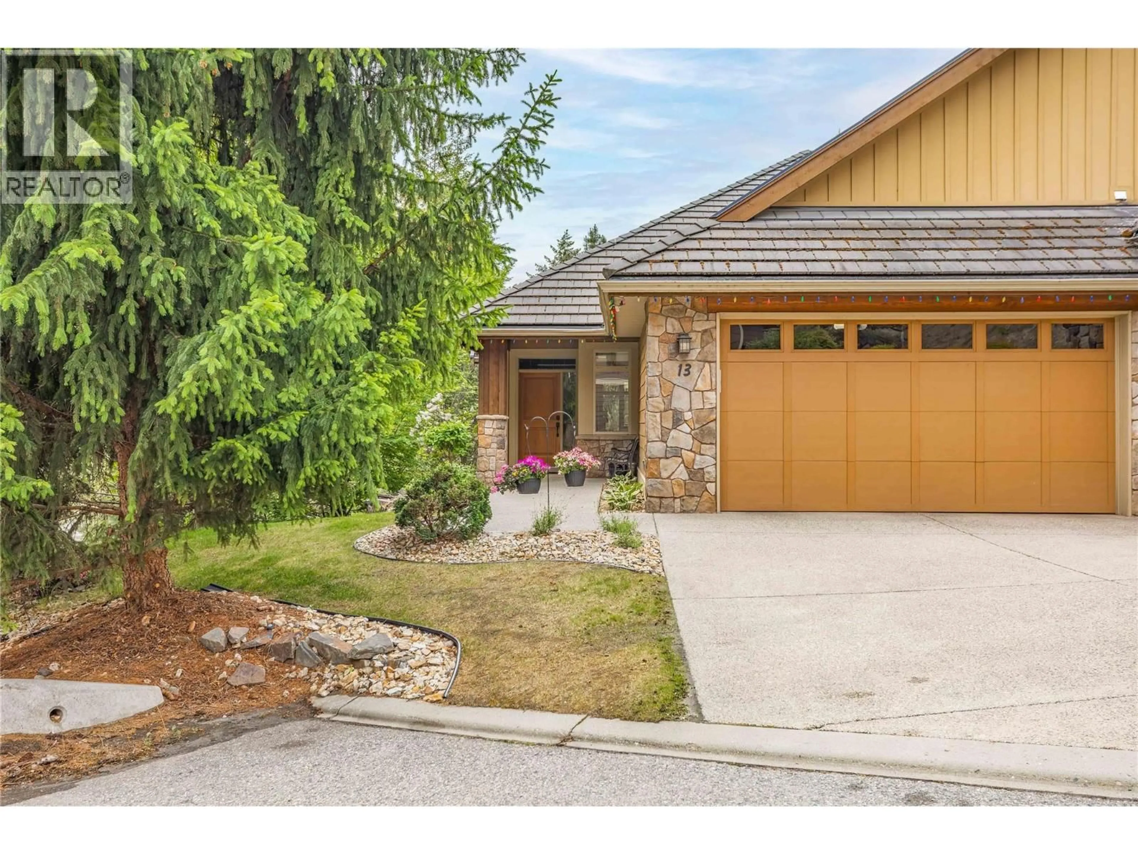 Home with brick exterior material, street for 13 - 669 LONG RIDGE DRIVE, Kelowna British Columbia V1V2R9