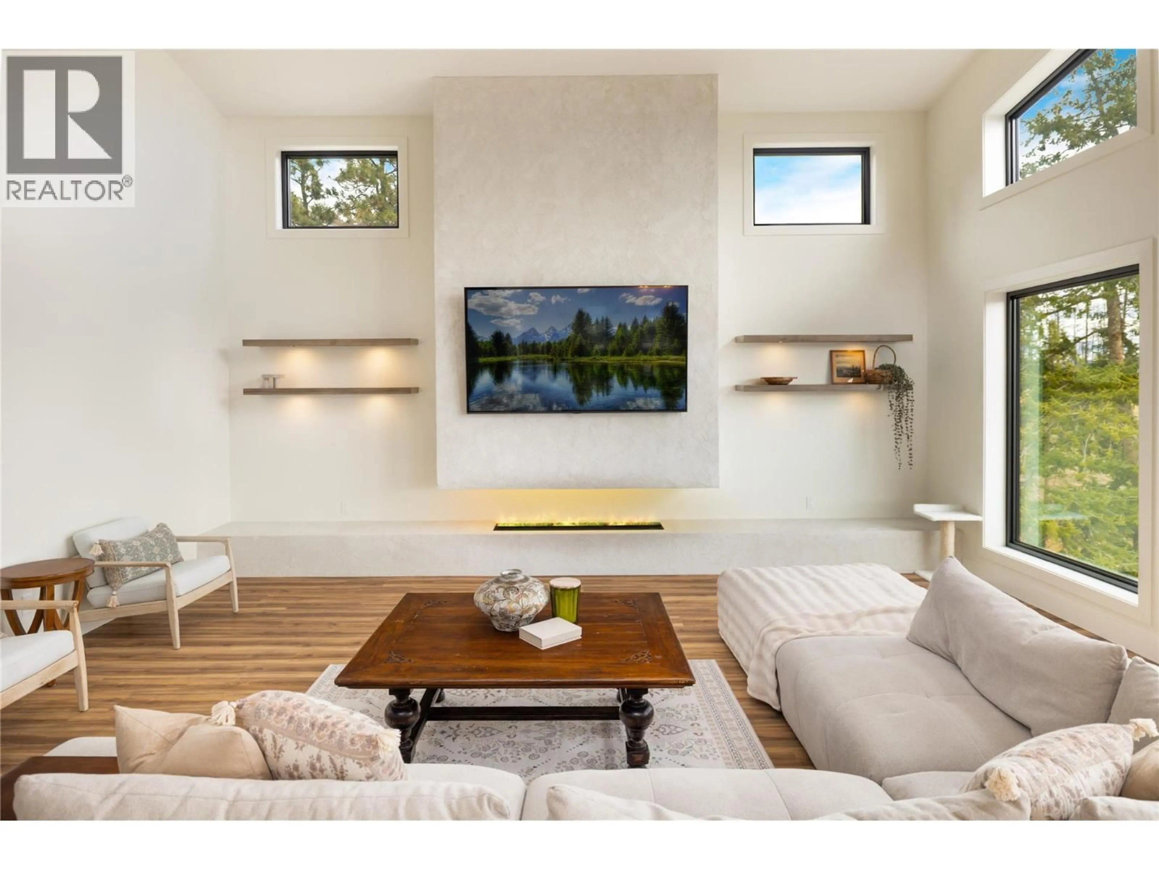 Living room with furniture, wood/laminate floor for 1435 BEAR CREEK ROAD, West Kelowna British Columbia V1Z2S2