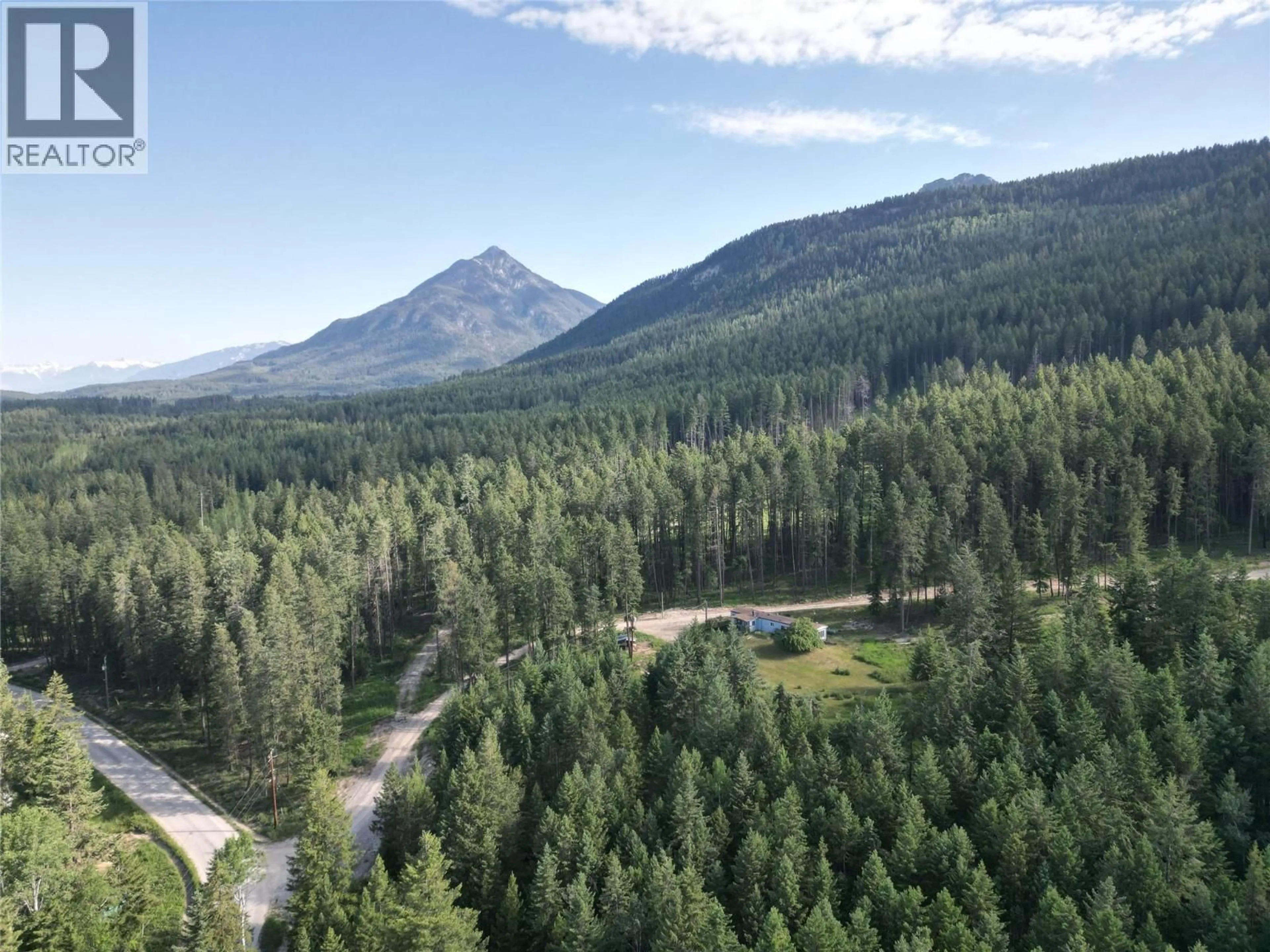 A pic from outside/outdoor area/front of a property/back of a property/a pic from drone, forest/trees view for 601 LAPP ROAD, Golden British Columbia V0A1H3