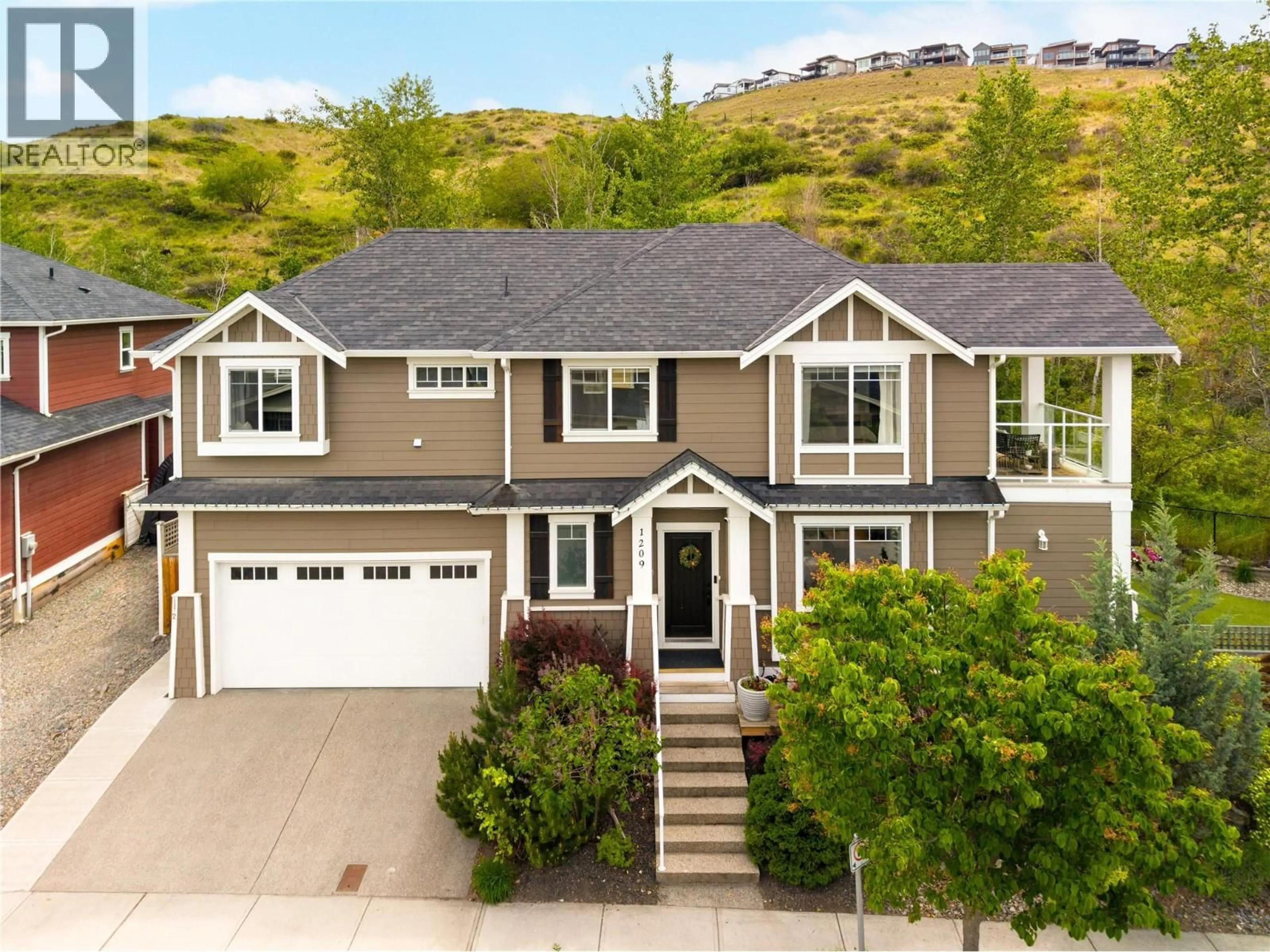 Home with vinyl exterior material, mountain view for 1209 BERGAMOT AVENUE, Kelowna British Columbia V1W5K5