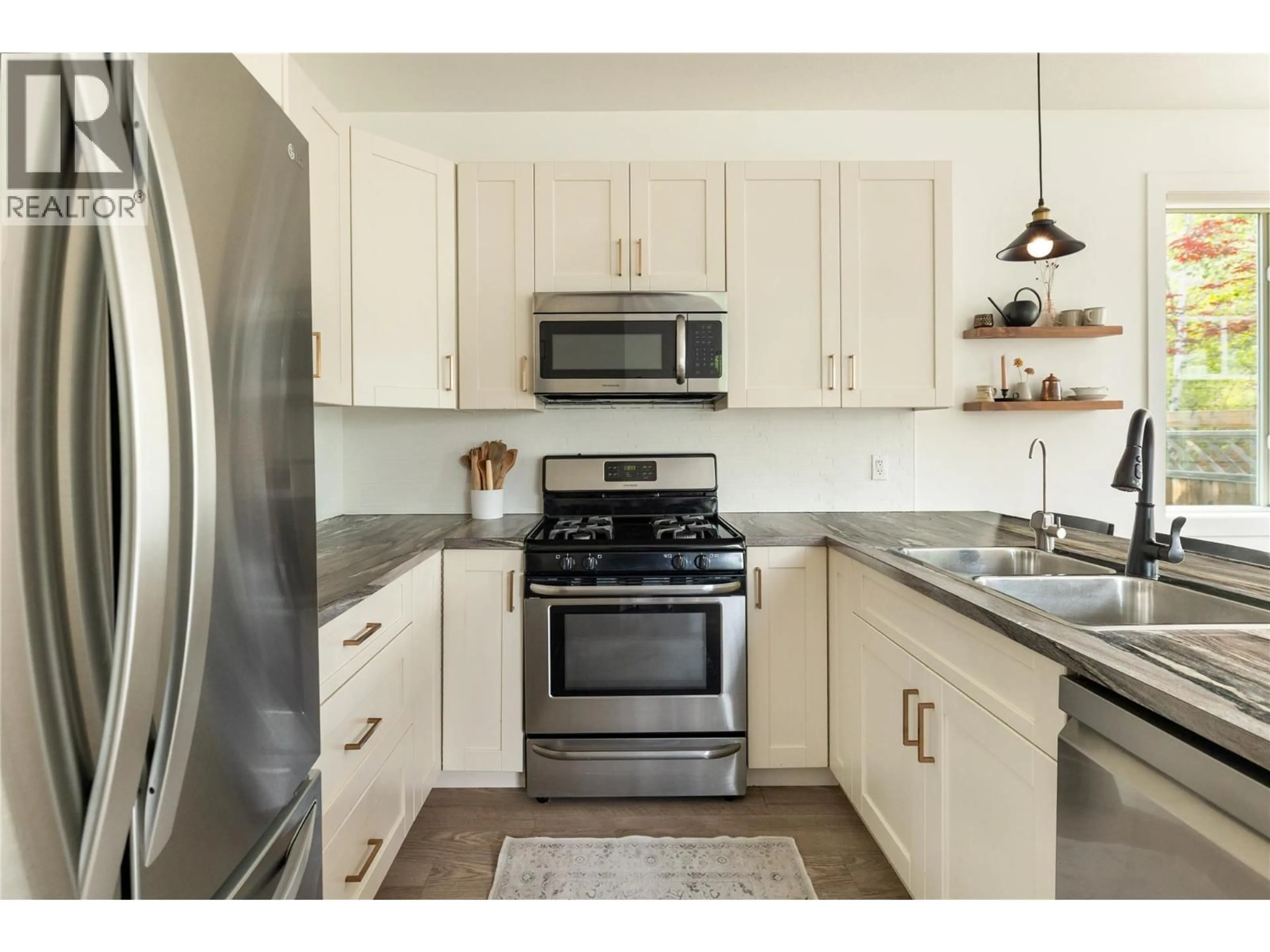 Open concept kitchen, unknown for 1209 BERGAMOT AVENUE, Kelowna British Columbia V1W5K5