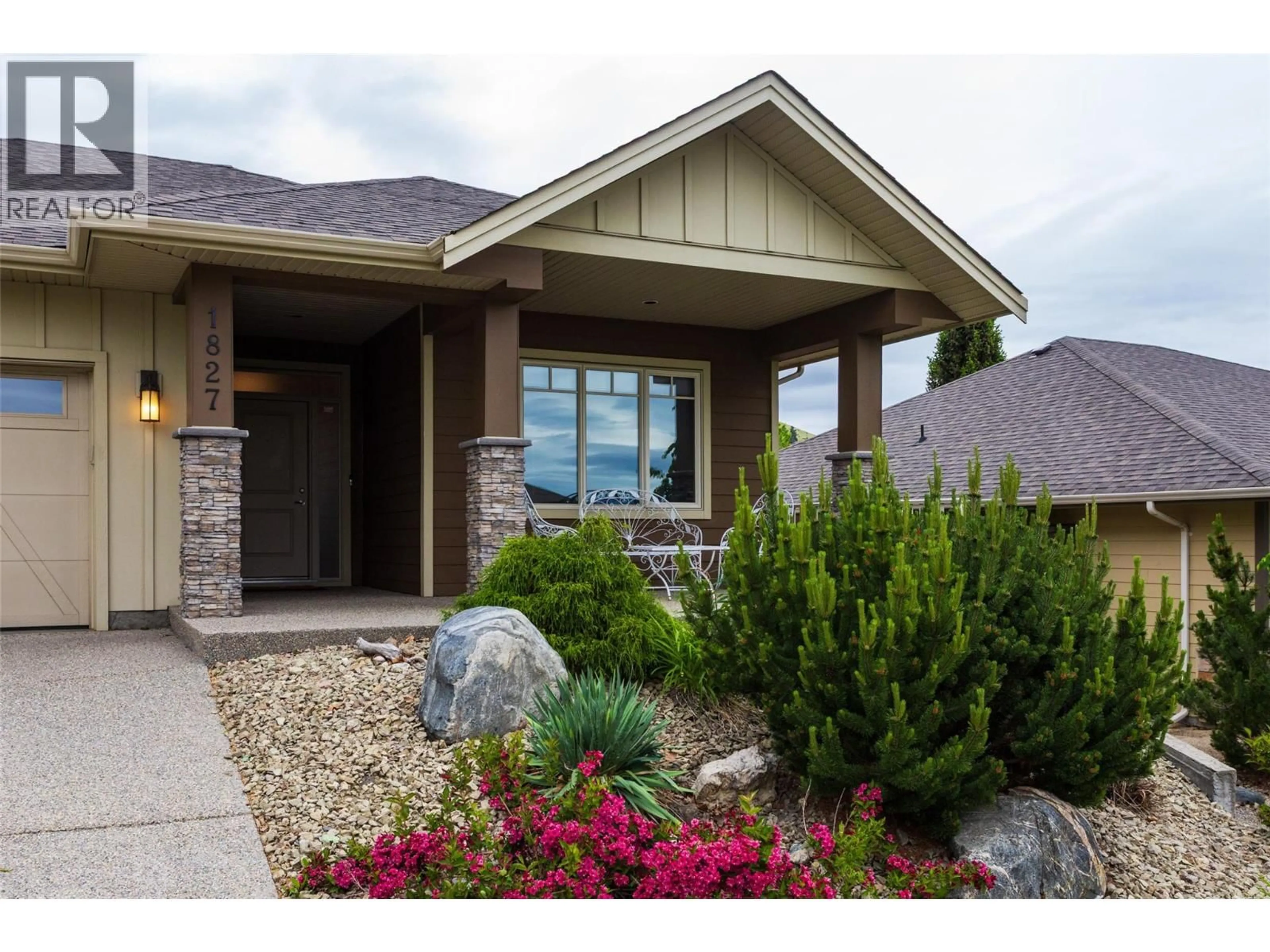 Home with brick exterior material, mountain view for 1827 TOWER RANCH BOULEVARD, Kelowna British Columbia V1P1R1