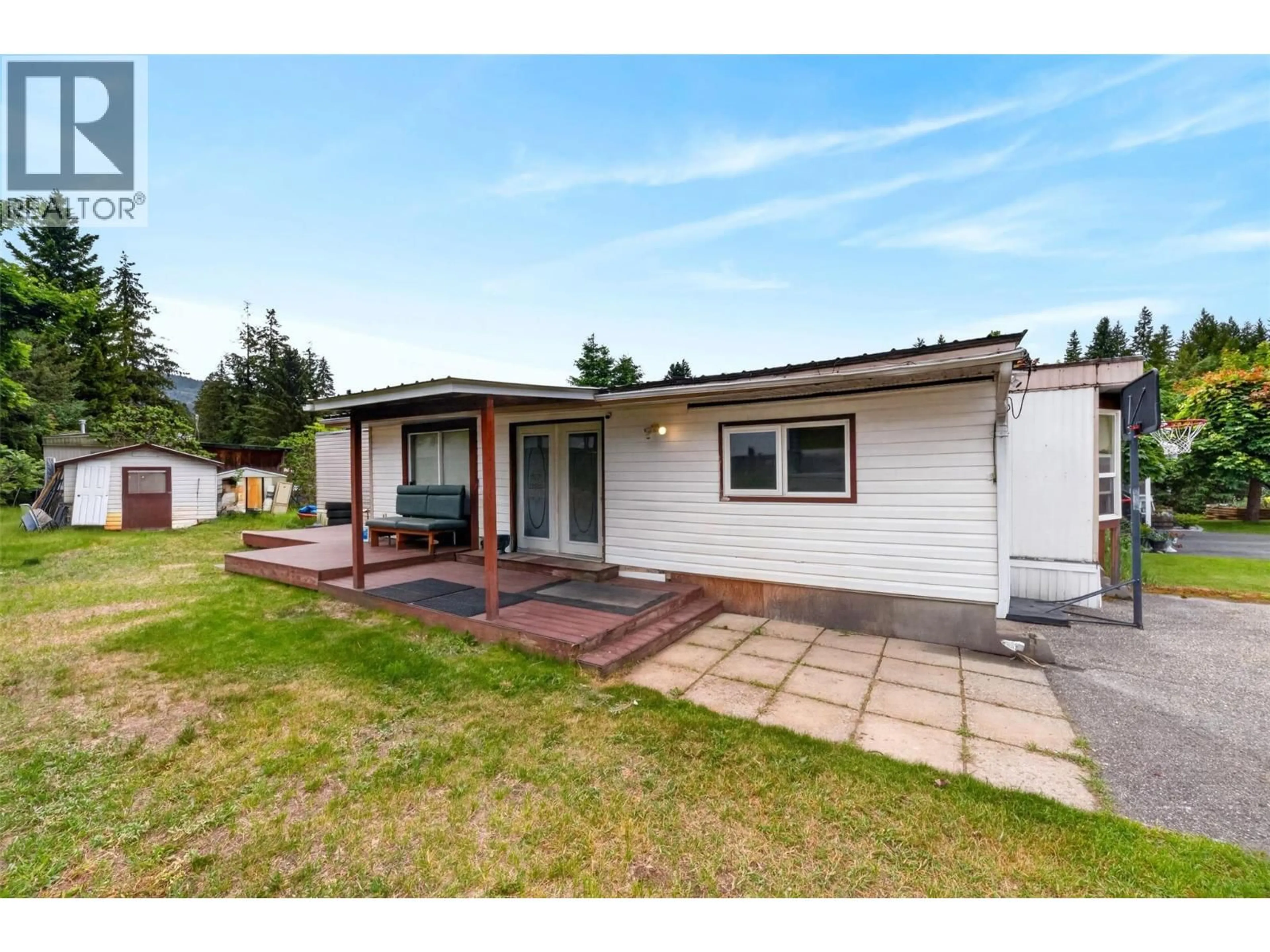 A pic from outside/outdoor area/front of a property/back of a property/a pic from drone, street for 144 - 2500 97B HIGHWAY SOUTHEAST, Salmon Arm British Columbia V1E1C2