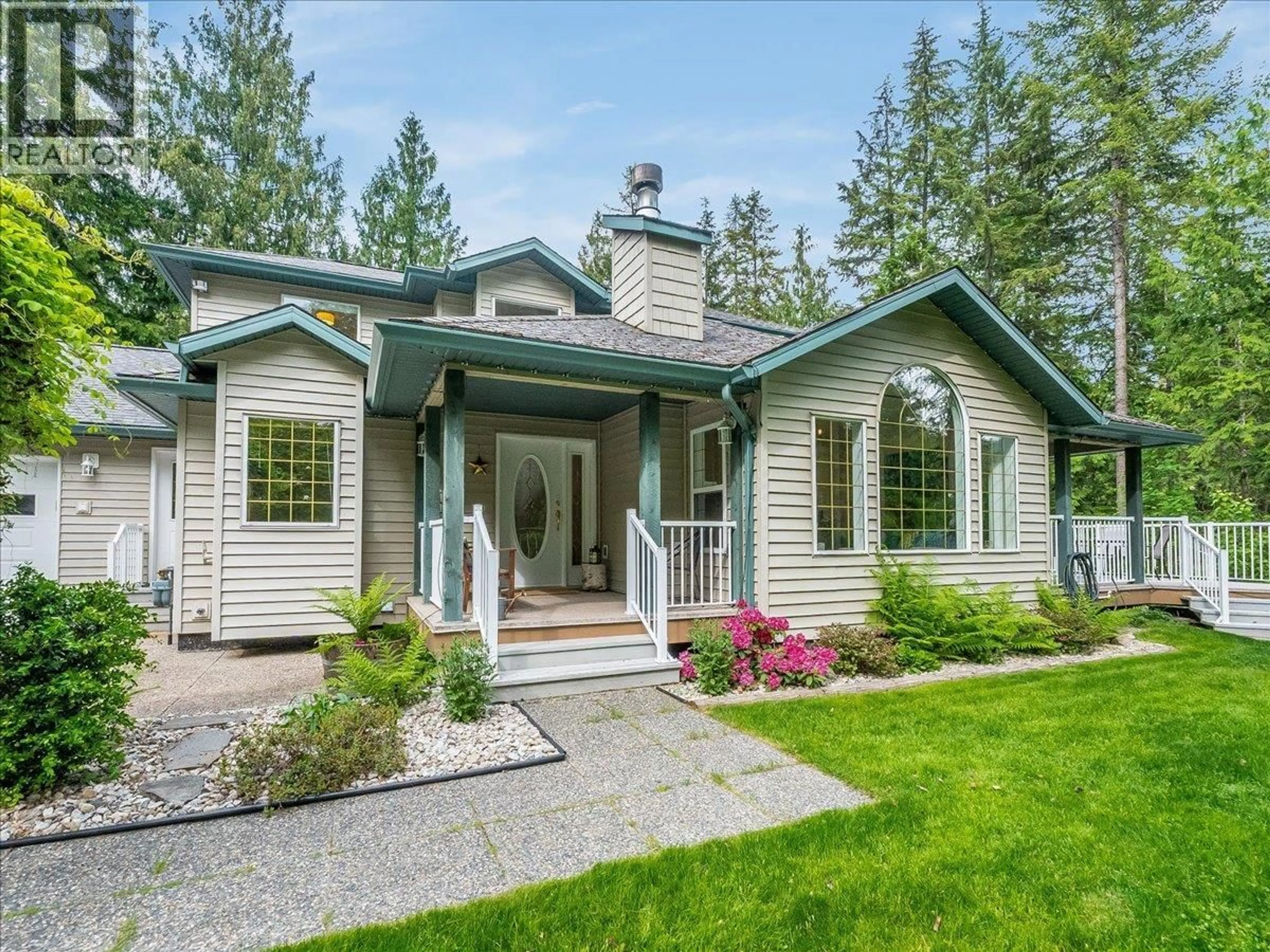 Home with vinyl exterior material, street for 2287 CRYSTAL SPRINGS ROAD, Nelson British Columbia V1L6K4