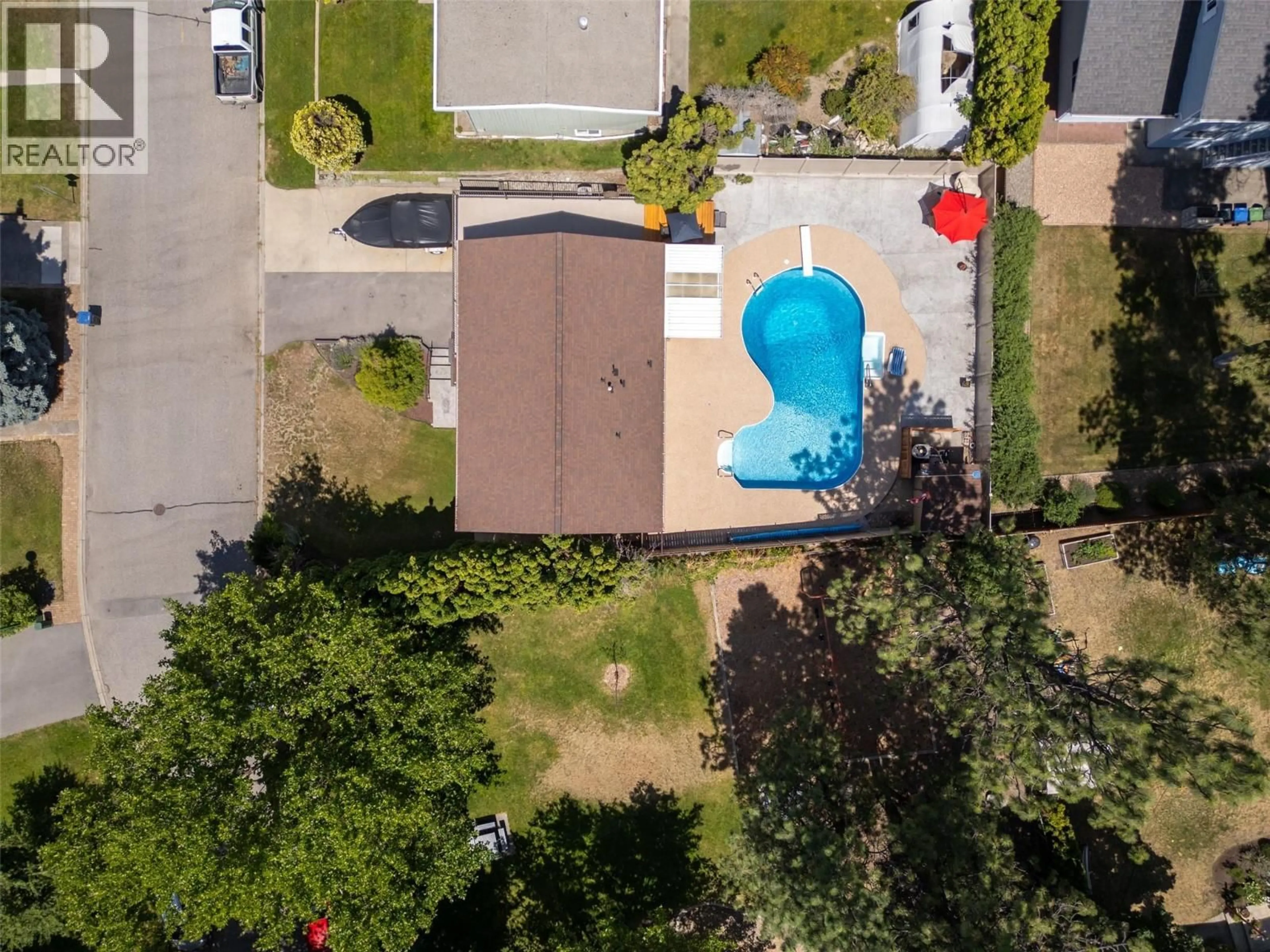A pic from outside/outdoor area/front of a property/back of a property/a pic from drone, street for 186 DUNANT CRESCENT, Penticton British Columbia V2A3G2