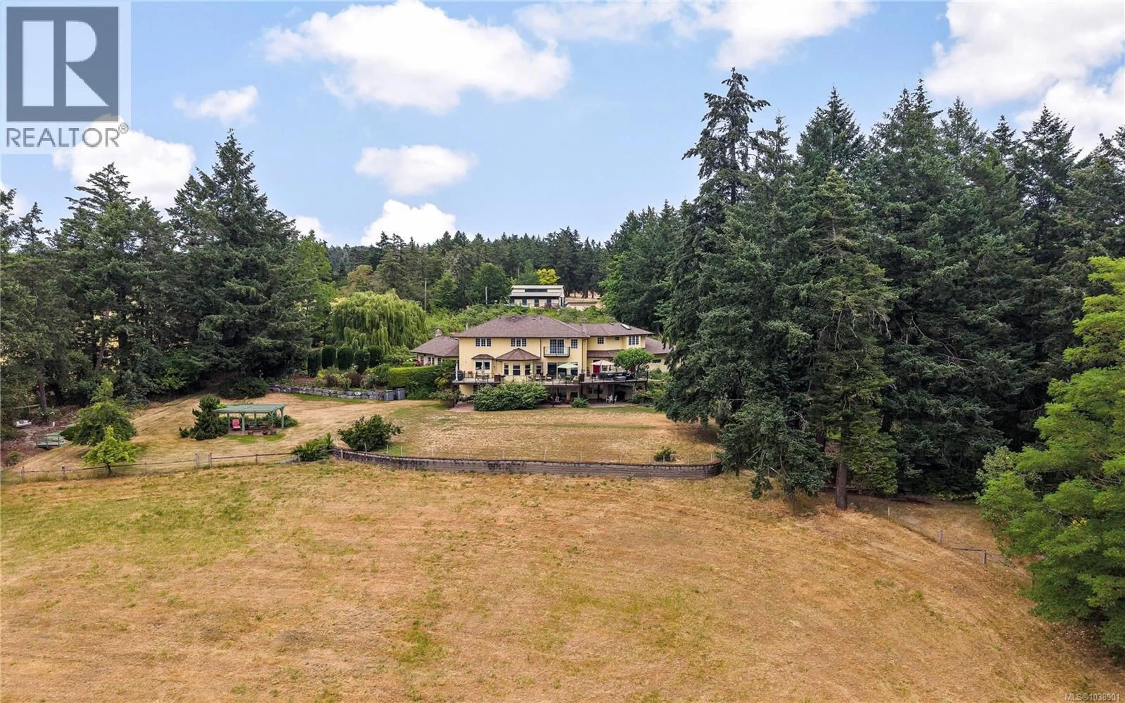 A pic from outside/outdoor area/front of a property/back of a property/a pic from drone, mountain view for 1662 STAMPS ROAD, Duncan British Columbia V9L5W2