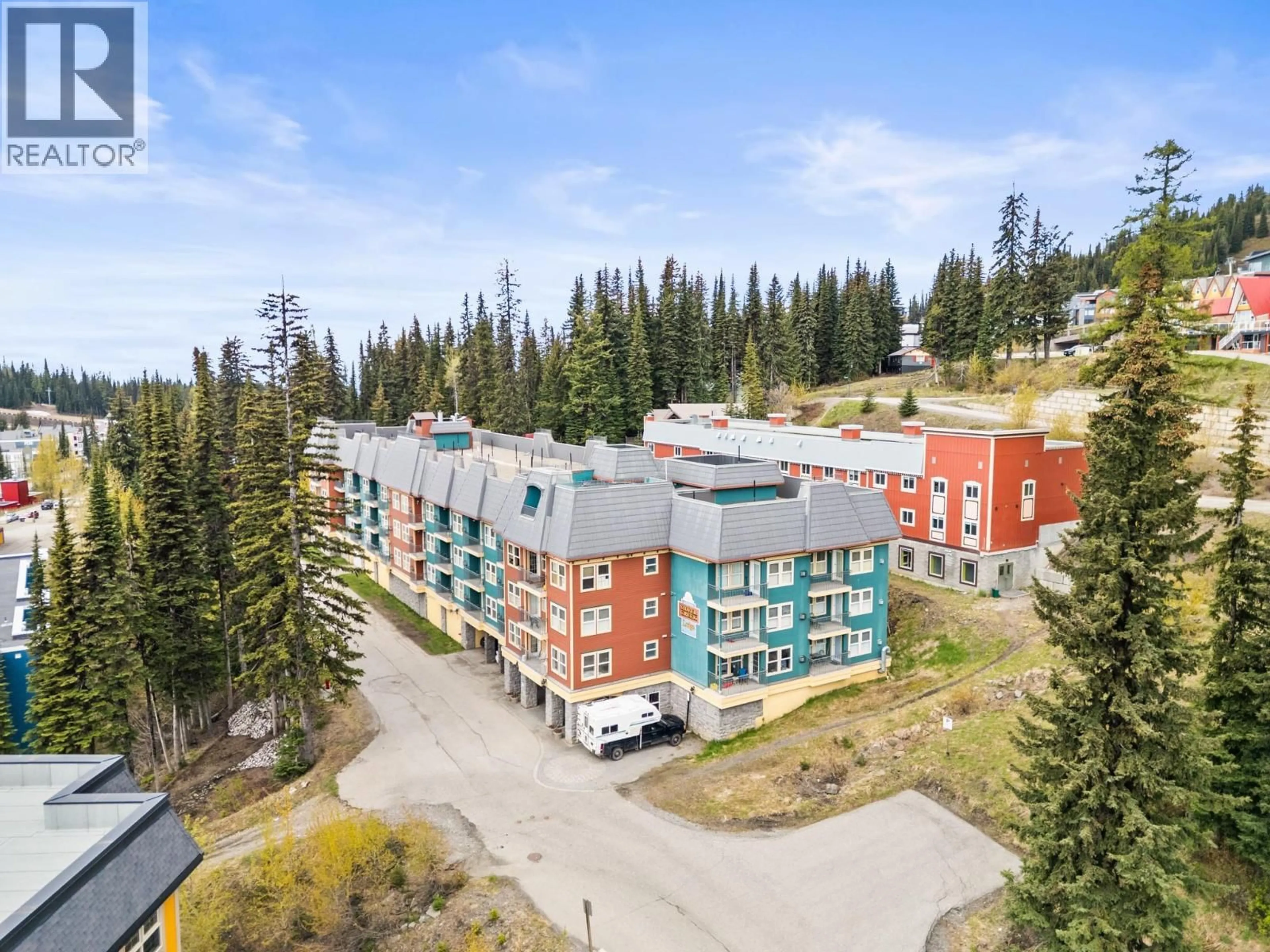 A pic from outside/outdoor area/front of a property/back of a property/a pic from drone, mountain view for 256 - 155 SILVER LODE LANE, Vernon British Columbia V1B3M1