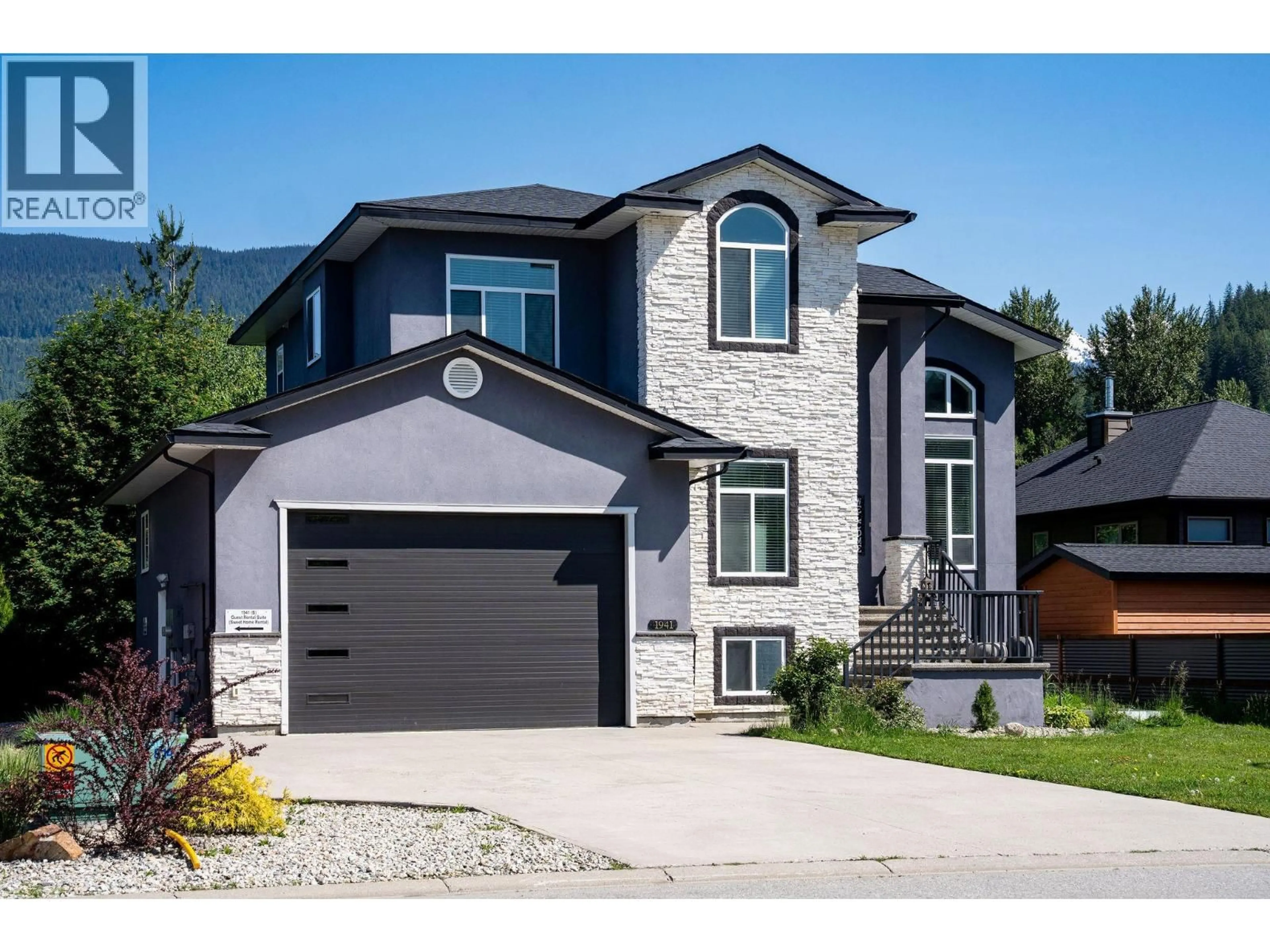 Home with vinyl exterior material, street for 1941 POPLAR LANE, Revelstoke British Columbia V0E2S3