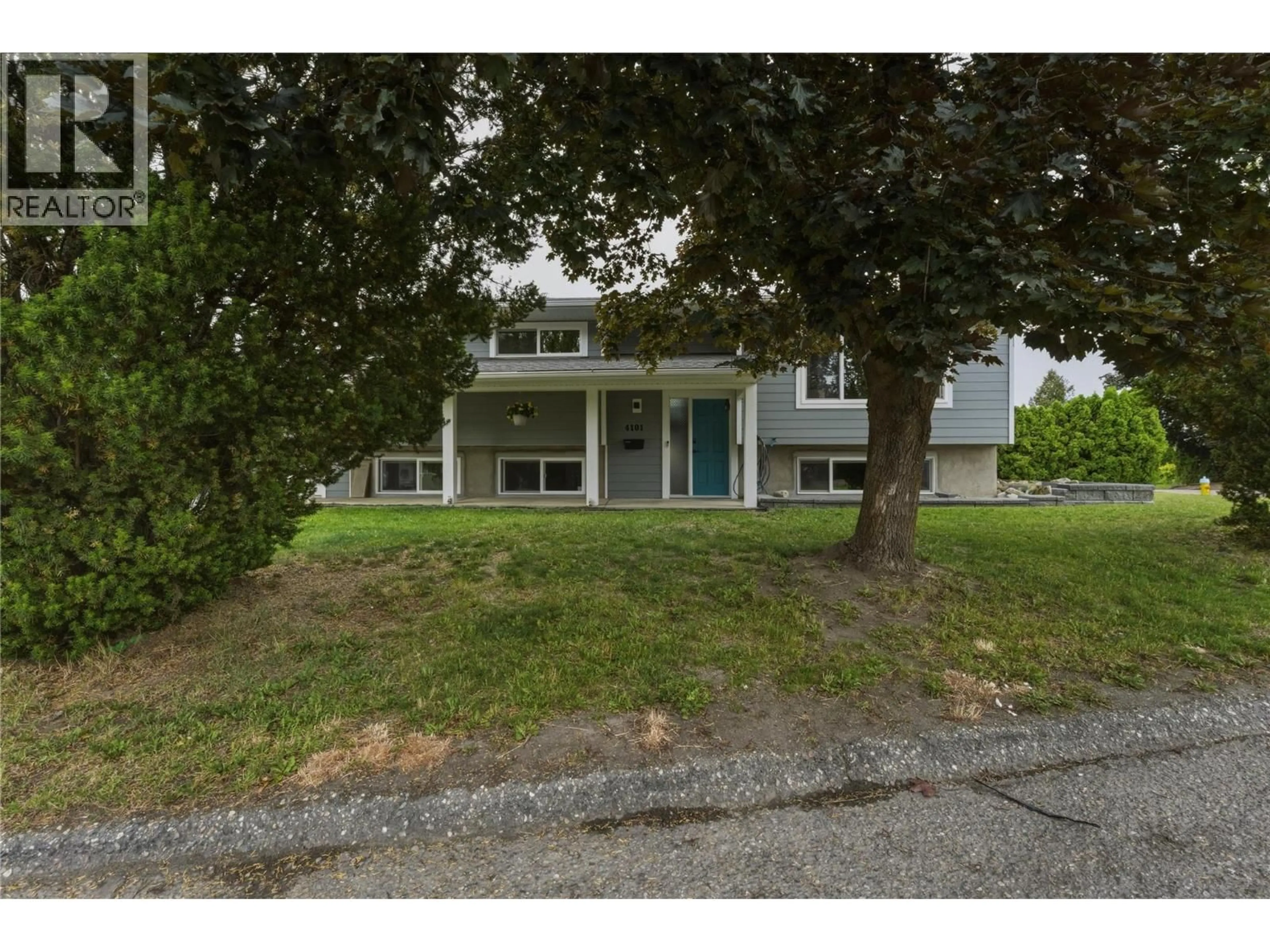 A pic from outside/outdoor area/front of a property/back of a property/a pic from drone, street for 4101 35 A STREET, Vernon British Columbia V1T6C7
