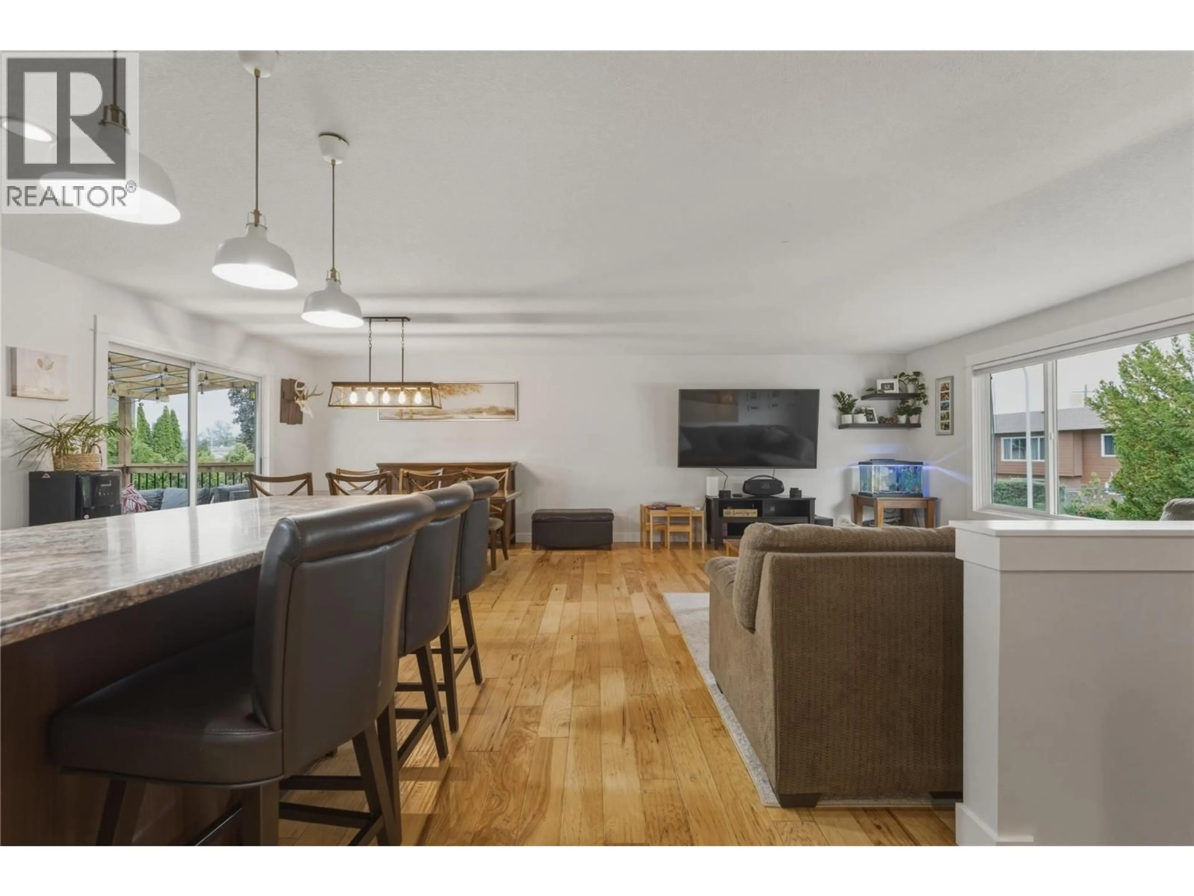 Open concept kitchen, wood/laminate floor for 4101 35 A STREET, Vernon British Columbia V1T6C7