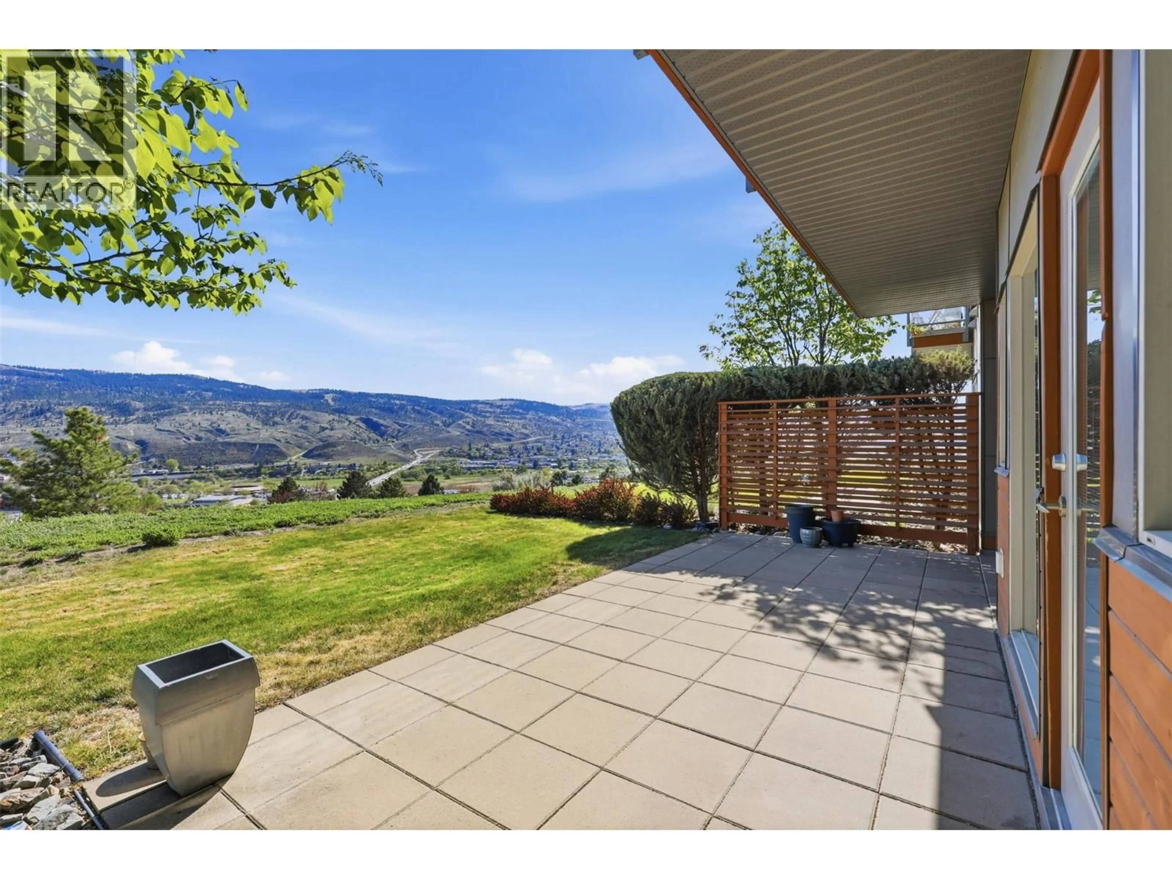 A pic from outside/outdoor area/front of a property/back of a property/a pic from drone, mountain view for 2117 - 1030 TALASA WAY, Kamloops British Columbia V2H0C3