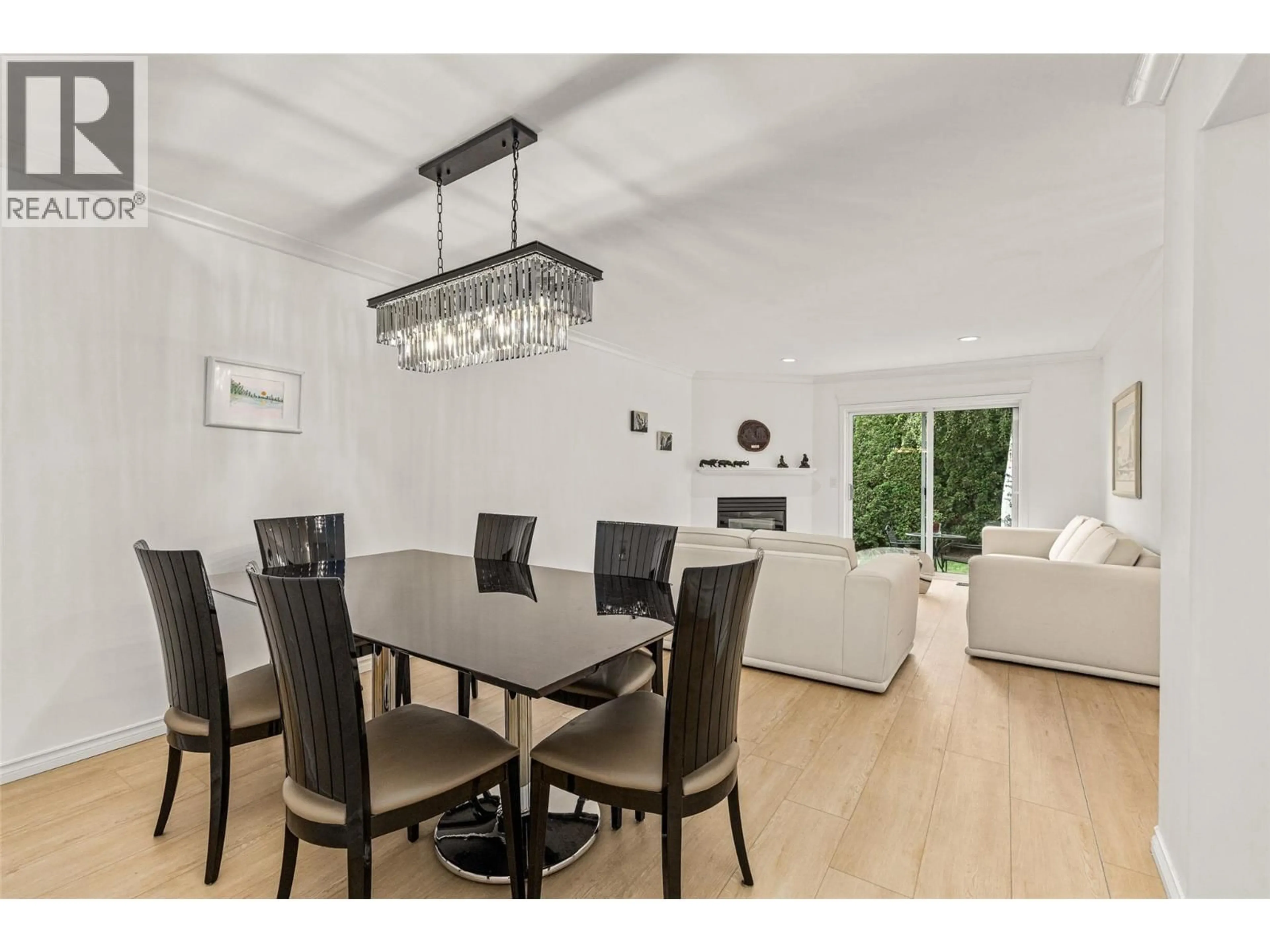 Dining room, wood/laminate floor for 37 - 545 GLENMEADOWS ROAD, Kelowna British Columbia V1V1W8