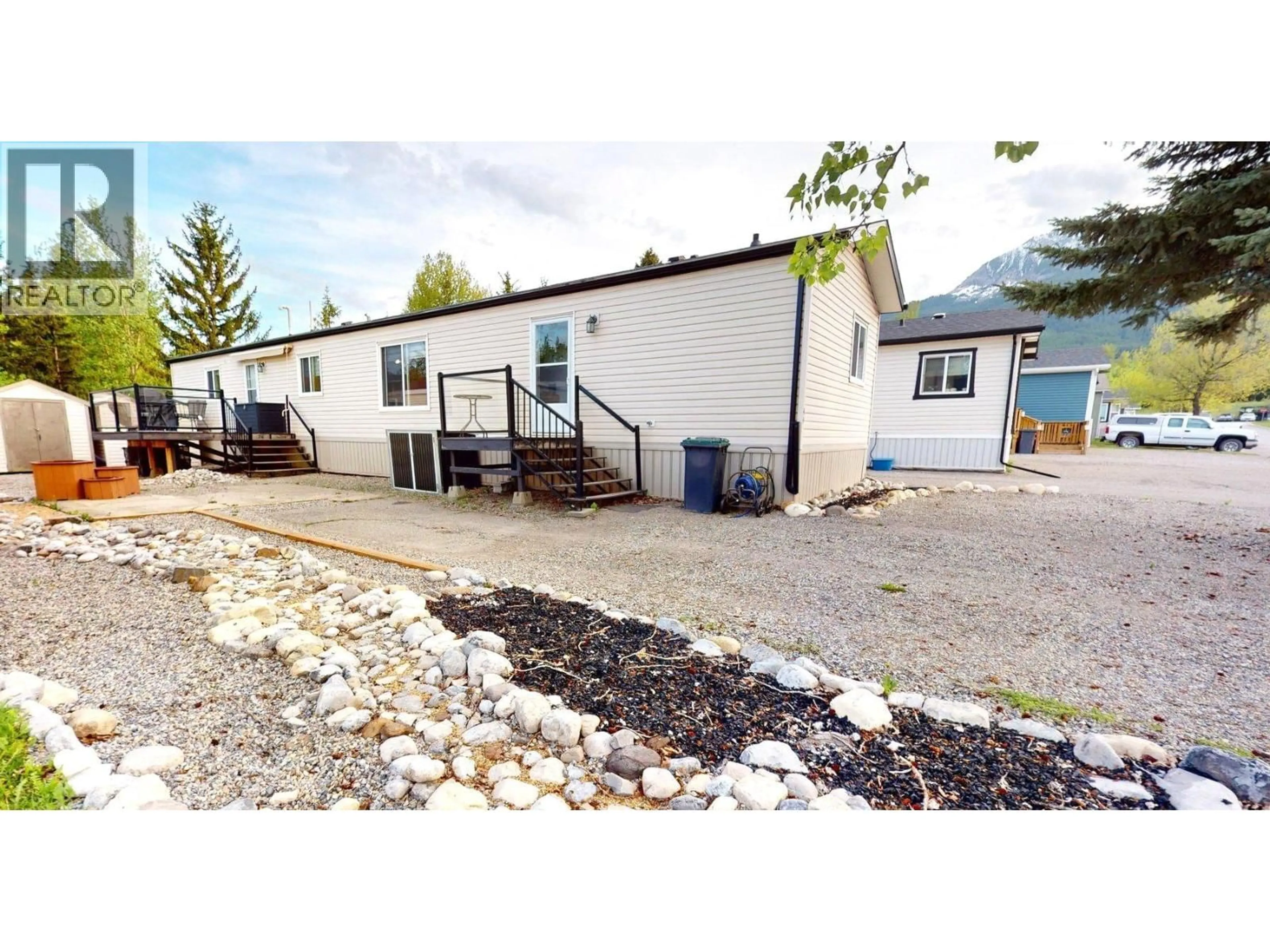 A pic from outside/outdoor area/front of a property/back of a property/a pic from drone, street for 44 WILDERNESS HEIGHTS DRIVE, Elkford British Columbia V0B1H0