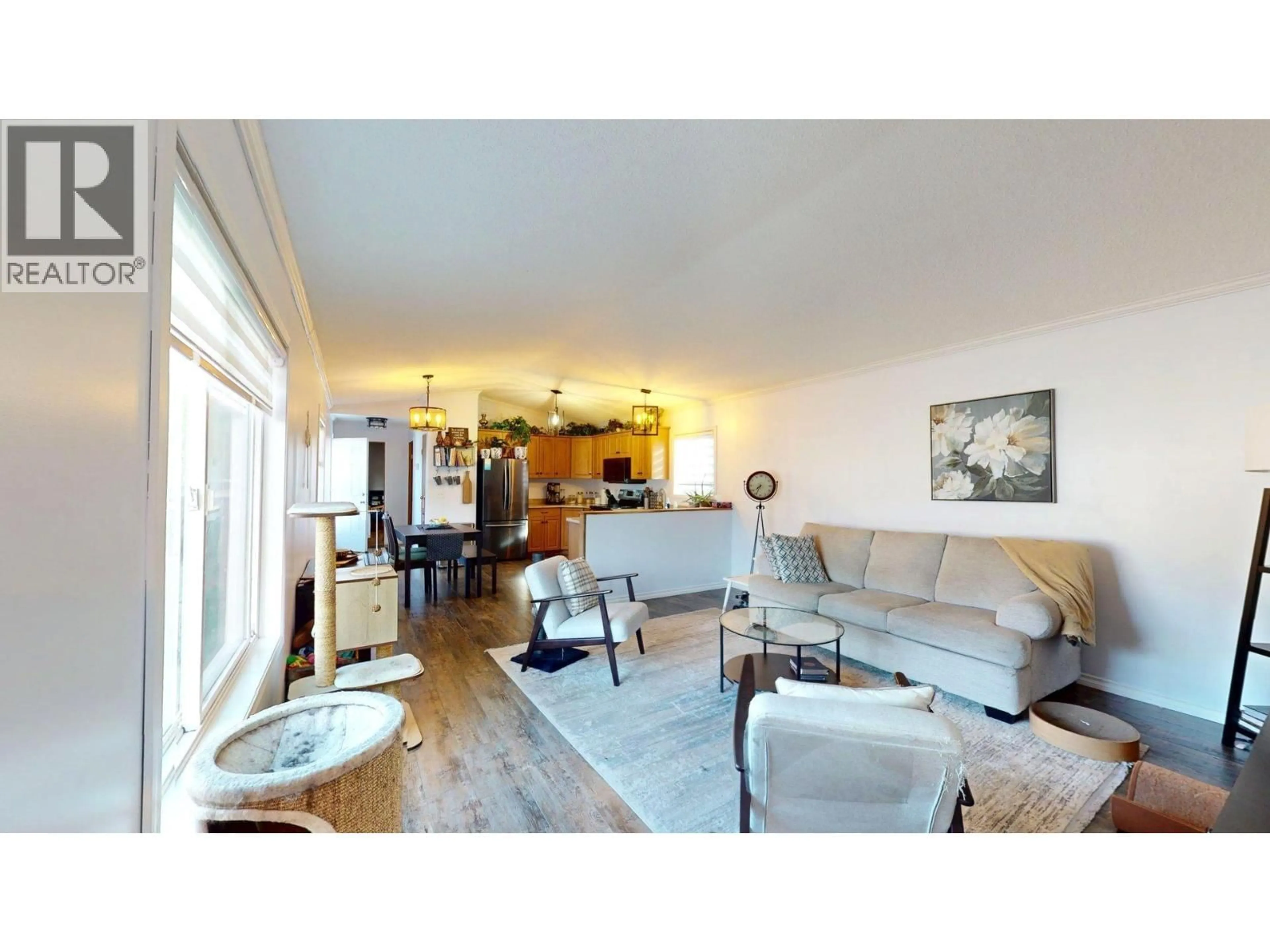 Living room with furniture, wood/laminate floor for 44 WILDERNESS HEIGHTS DRIVE, Elkford British Columbia V0B1H0