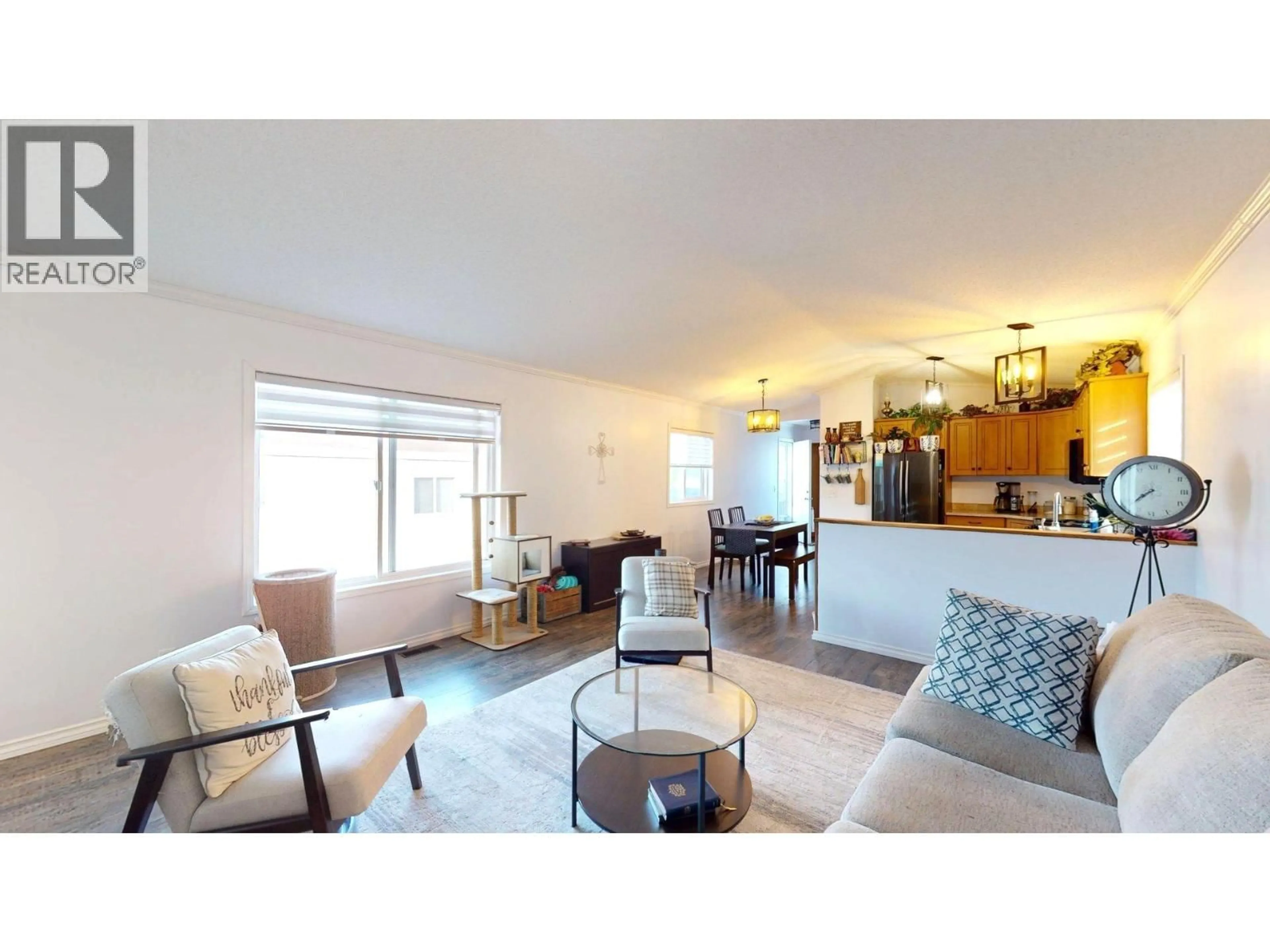 Living room with furniture, wood/laminate floor for 44 WILDERNESS HEIGHTS DRIVE, Elkford British Columbia V0B1H0