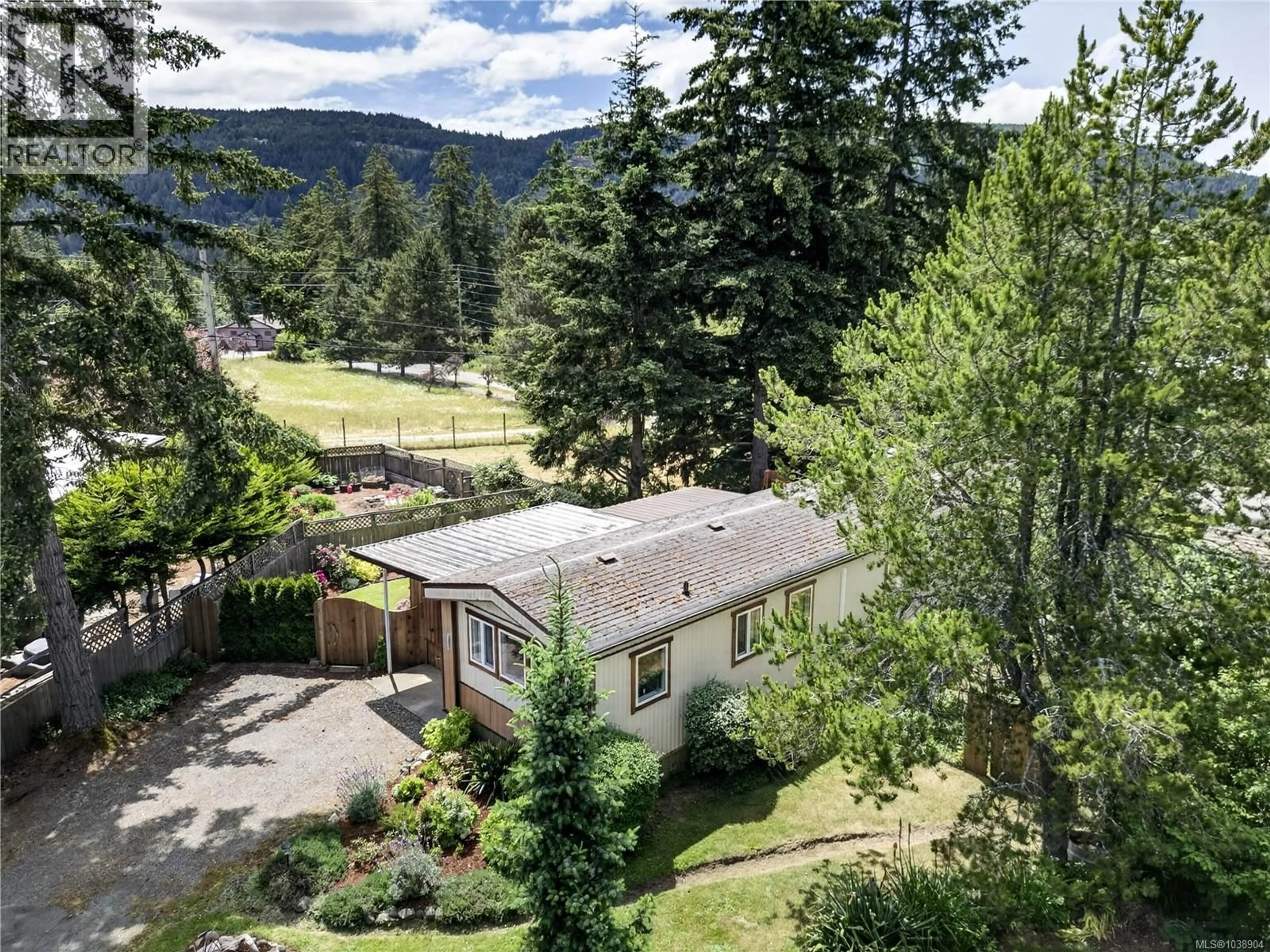 A pic from outside/outdoor area/front of a property/back of a property/a pic from drone, mountain view for 2053 - 135 BRINKWORTHY ROAD, Salt Spring British Columbia V8K1S2