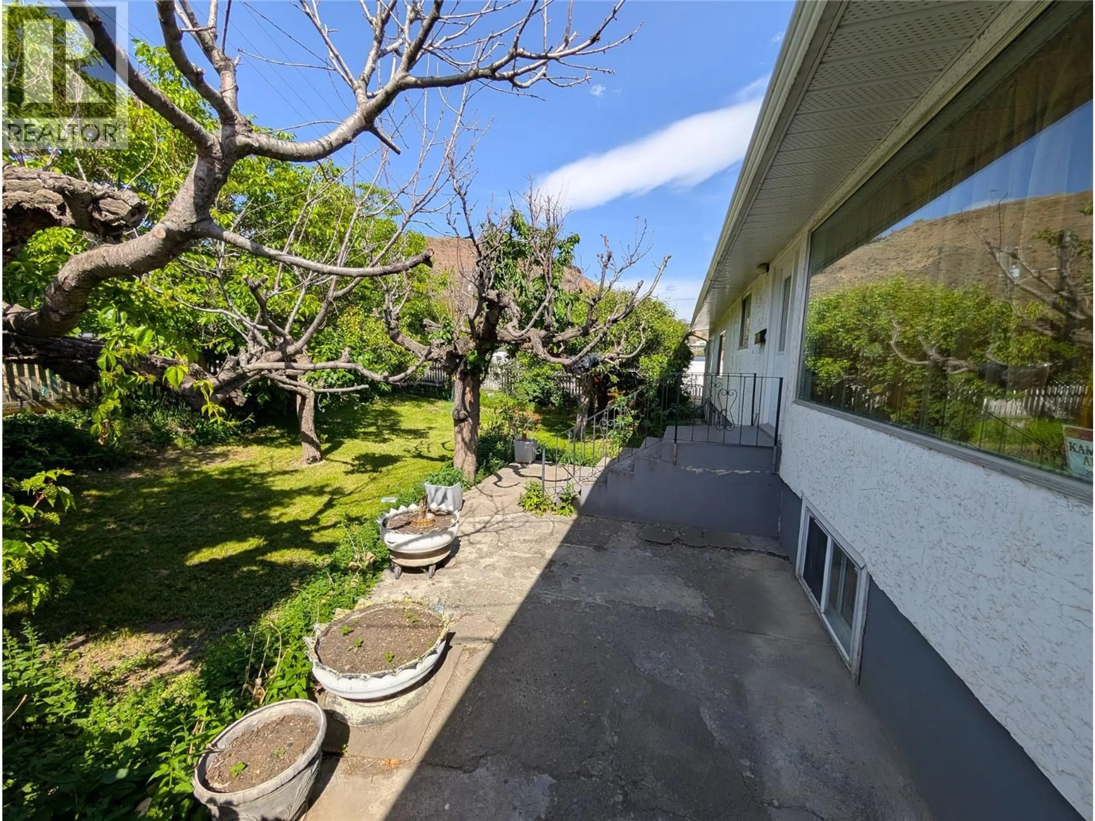 A pic from outside/outdoor area/front of a property/back of a property/a pic from drone, street for 1449 ORD ROAD, Kamloops British Columbia V2B7V2