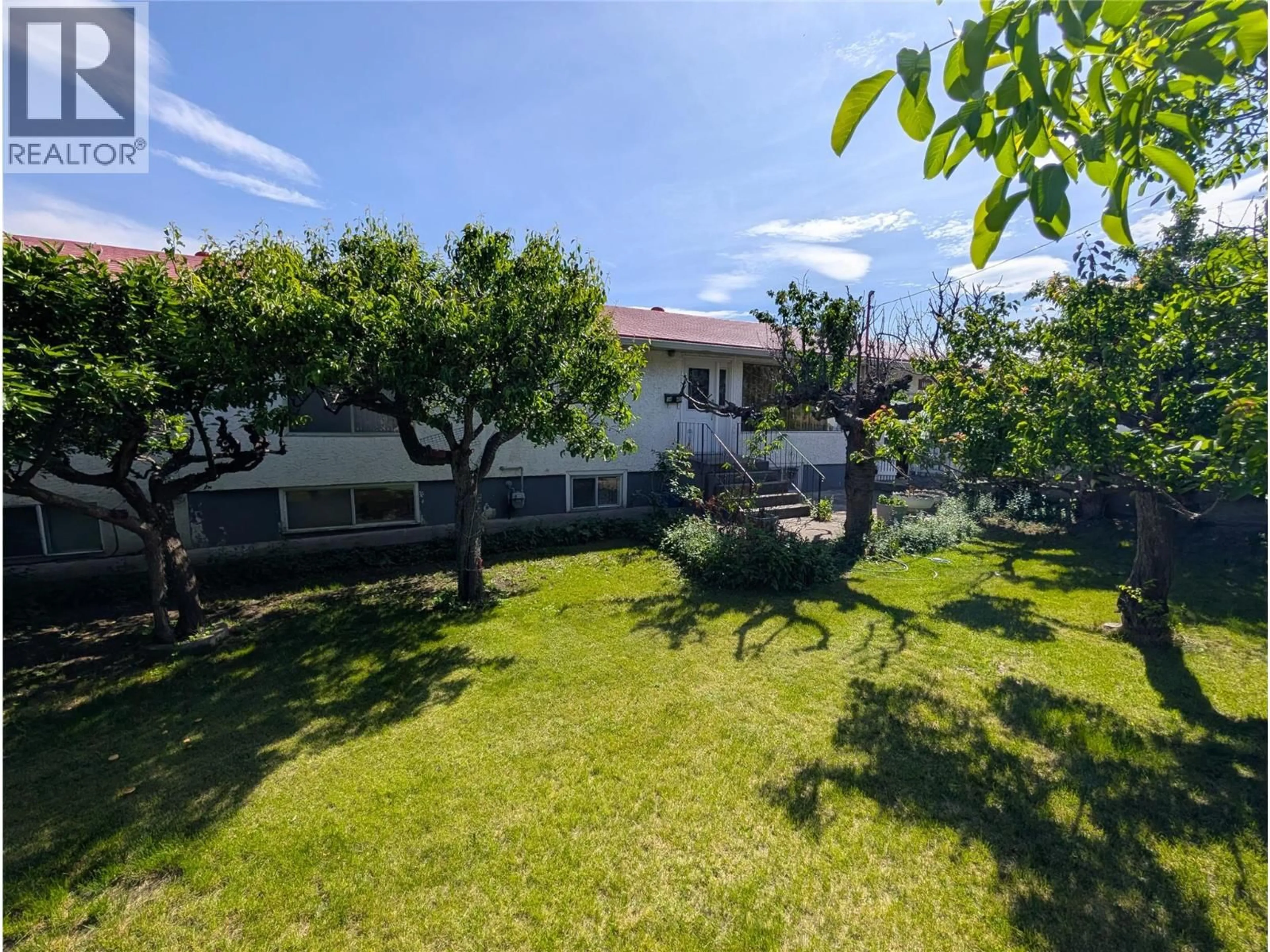 A pic from outside/outdoor area/front of a property/back of a property/a pic from drone, street for 1449 ORD ROAD, Kamloops British Columbia V2B7V2