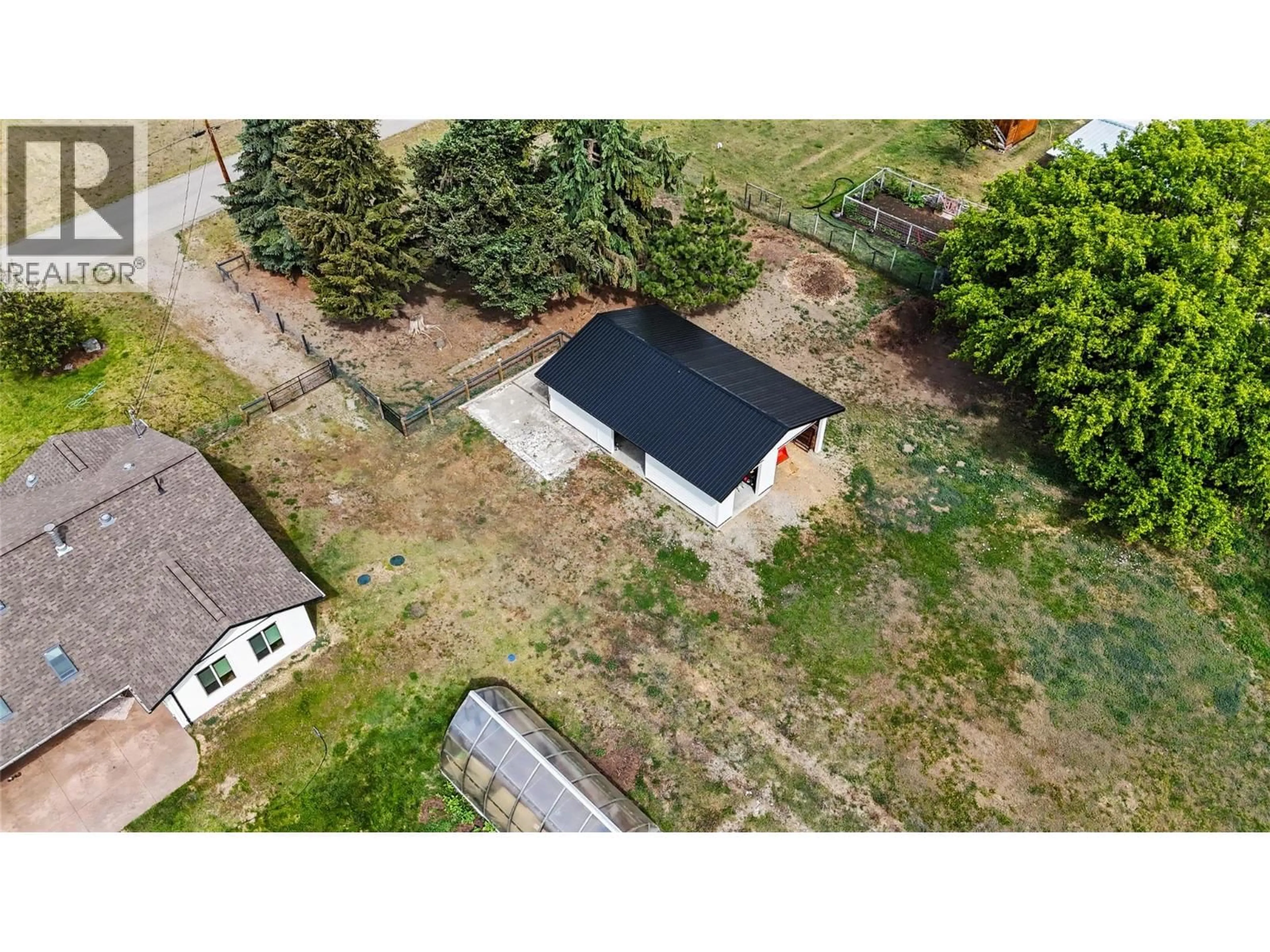 A pic from outside/outdoor area/front of a property/back of a property/a pic from drone, street for 8170 PLOTNIKOFF ROAD, Grand Forks British Columbia V0H1H2
