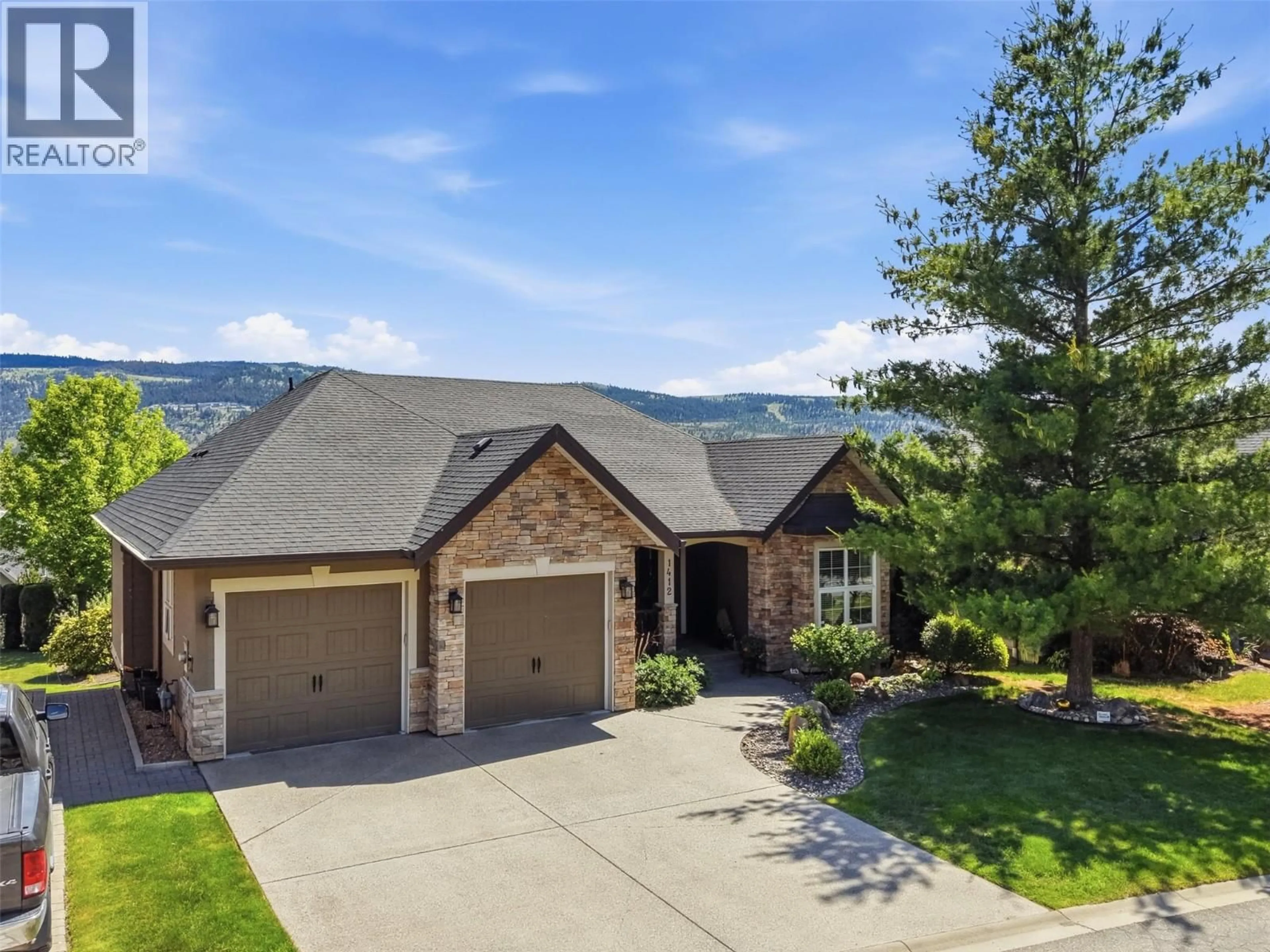 A pic from outside/outdoor area/front of a property/back of a property/a pic from drone, mountain view for 1412 SUN RIVERS DRIVE, Kamloops British Columbia V2H0A2