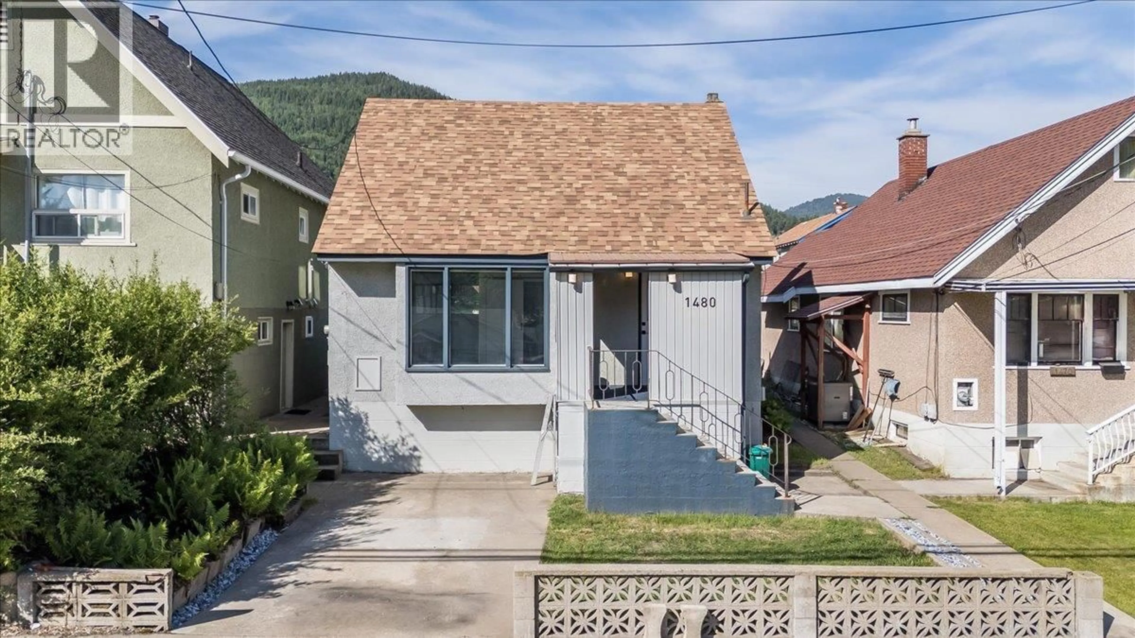 Home with brick exterior material, street for 1480 THIRD AVENUE, Trail British Columbia V1R1P6