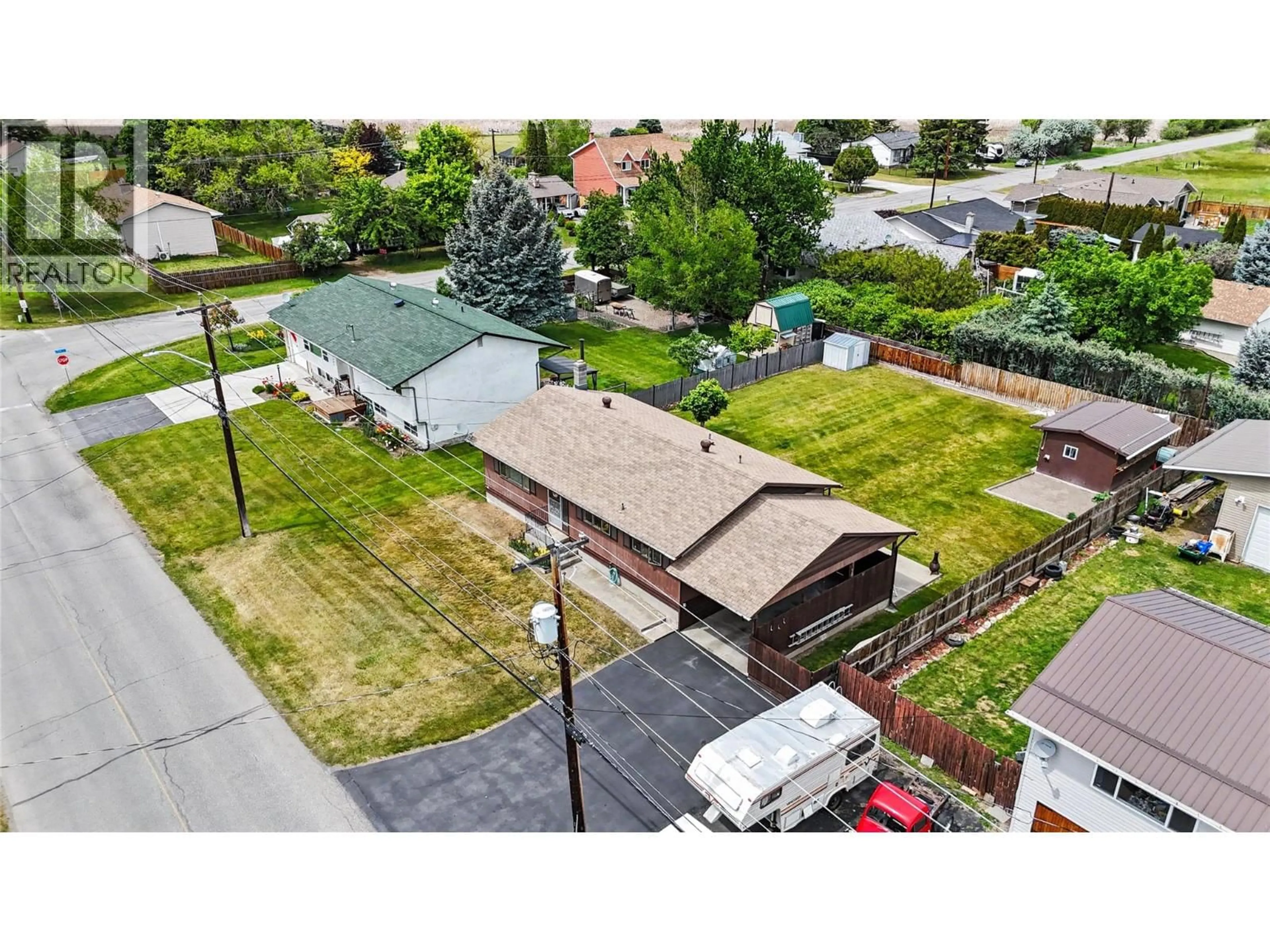 A pic from outside/outdoor area/front of a property/back of a property/a pic from drone, street for 1677 77TH AVENUE, Grand Forks British Columbia V0H1H0