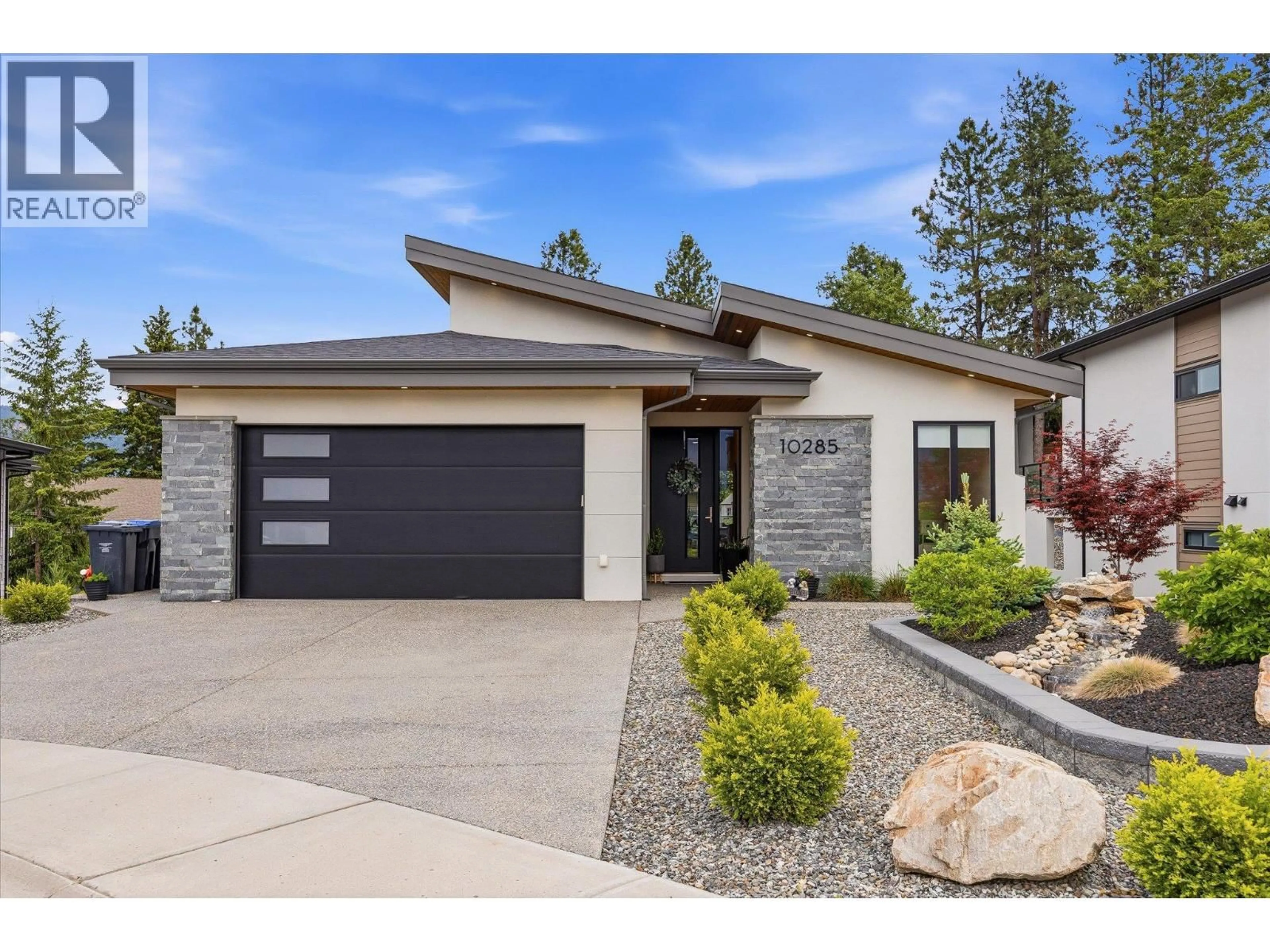 Home with brick exterior material, street for 10285 BEACON HILL DRIVE, Lake Country British Columbia V4V0A9