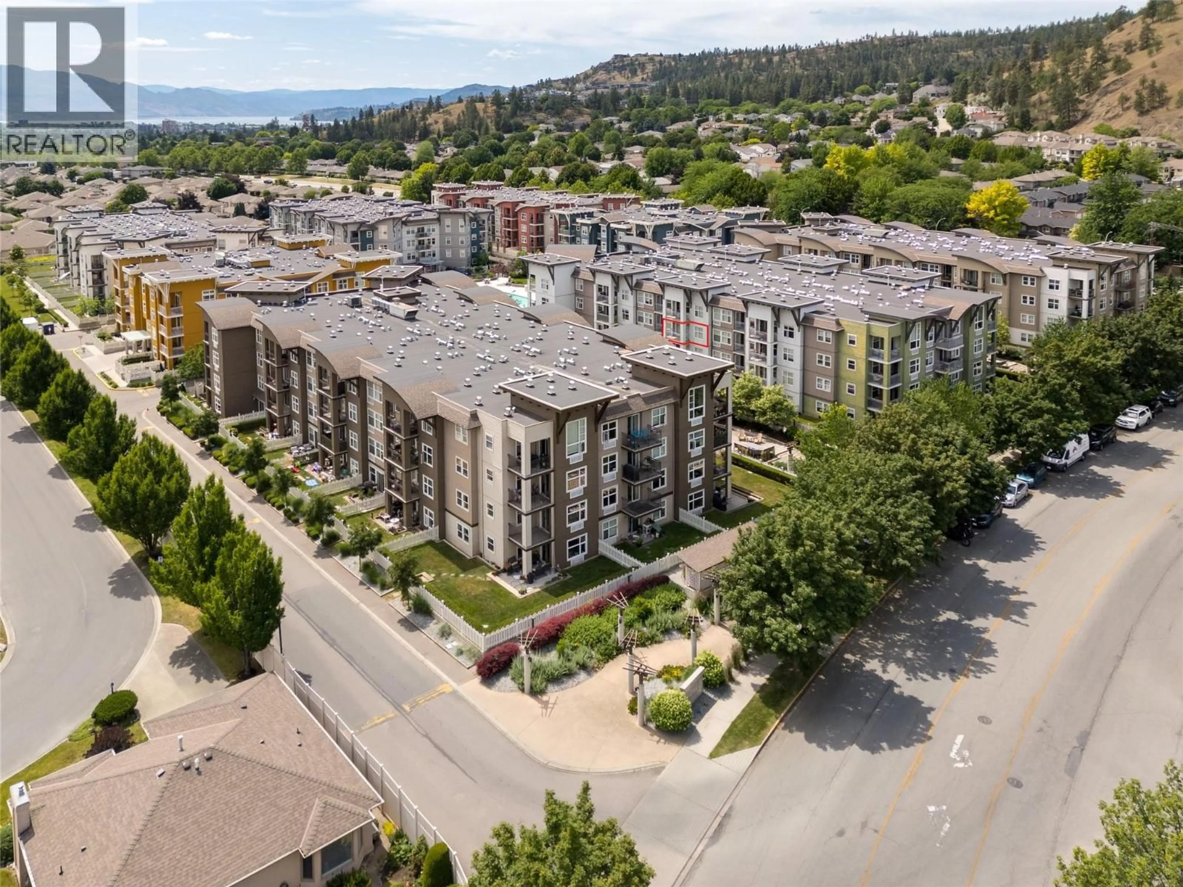 A pic from outside/outdoor area/front of a property/back of a property/a pic from drone, unknown for 308 - 539 YATES ROAD, Kelowna British Columbia V1V2T8