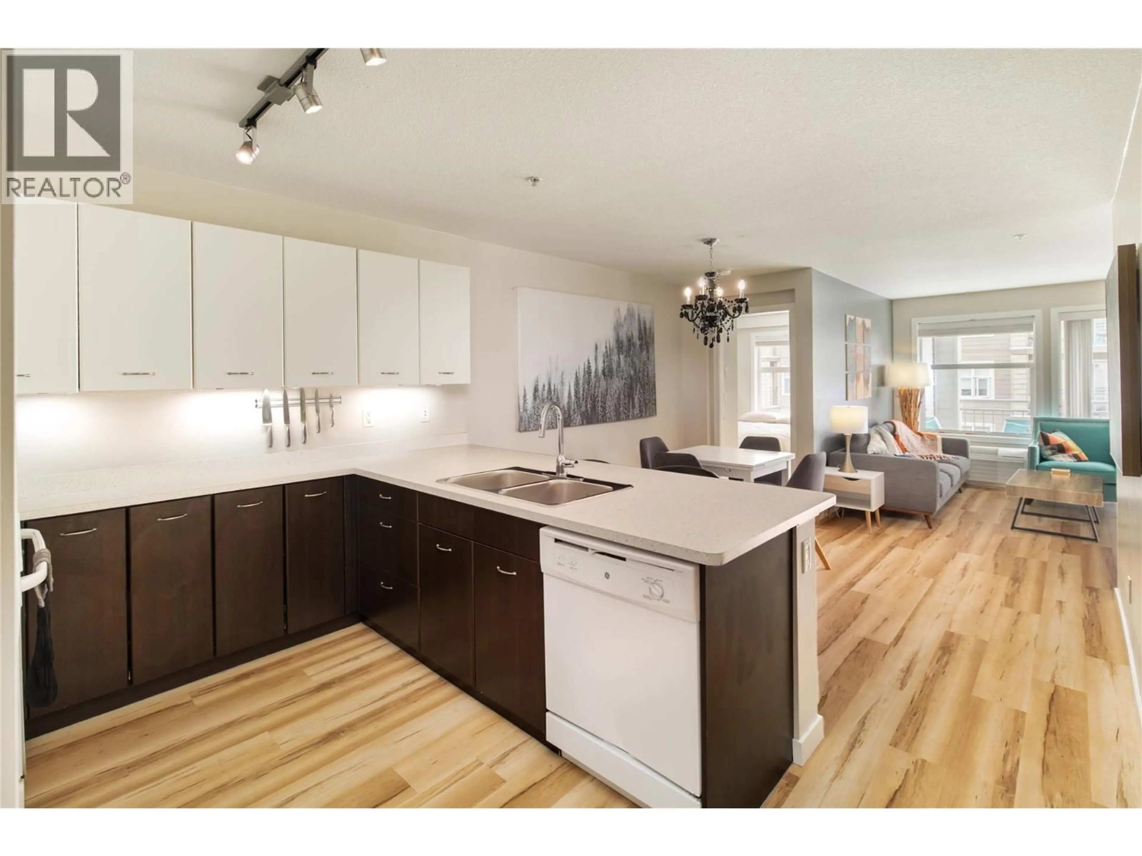Open concept kitchen, wood/laminate floor for 308 - 539 YATES ROAD, Kelowna British Columbia V1V2T8