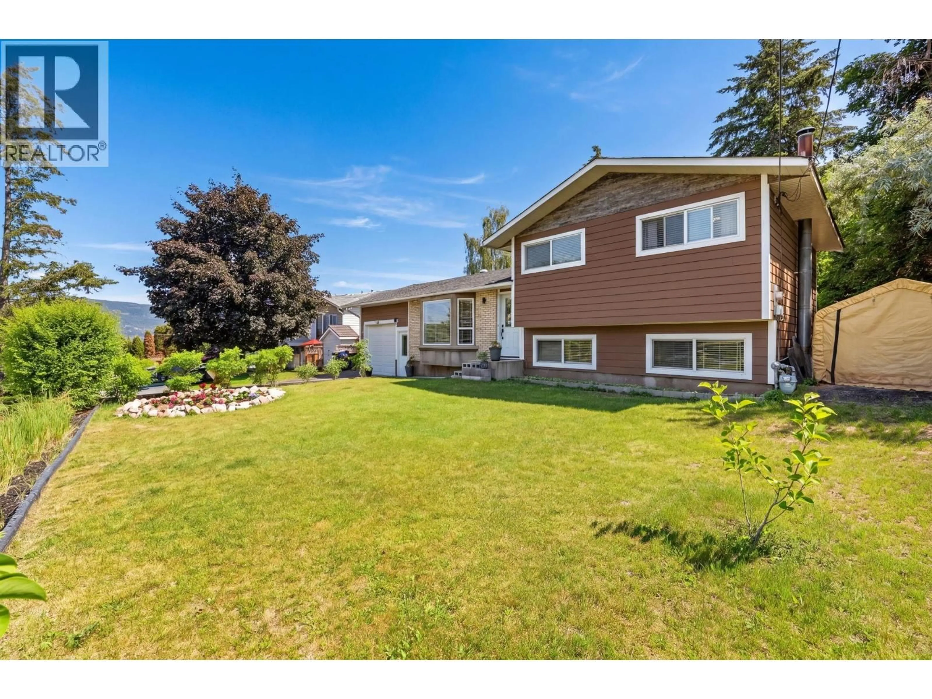 A pic from outside/outdoor area/front of a property/back of a property/a pic from drone, street for 10911 SHERMAN DRIVE, Lake Country British Columbia V4V1W8