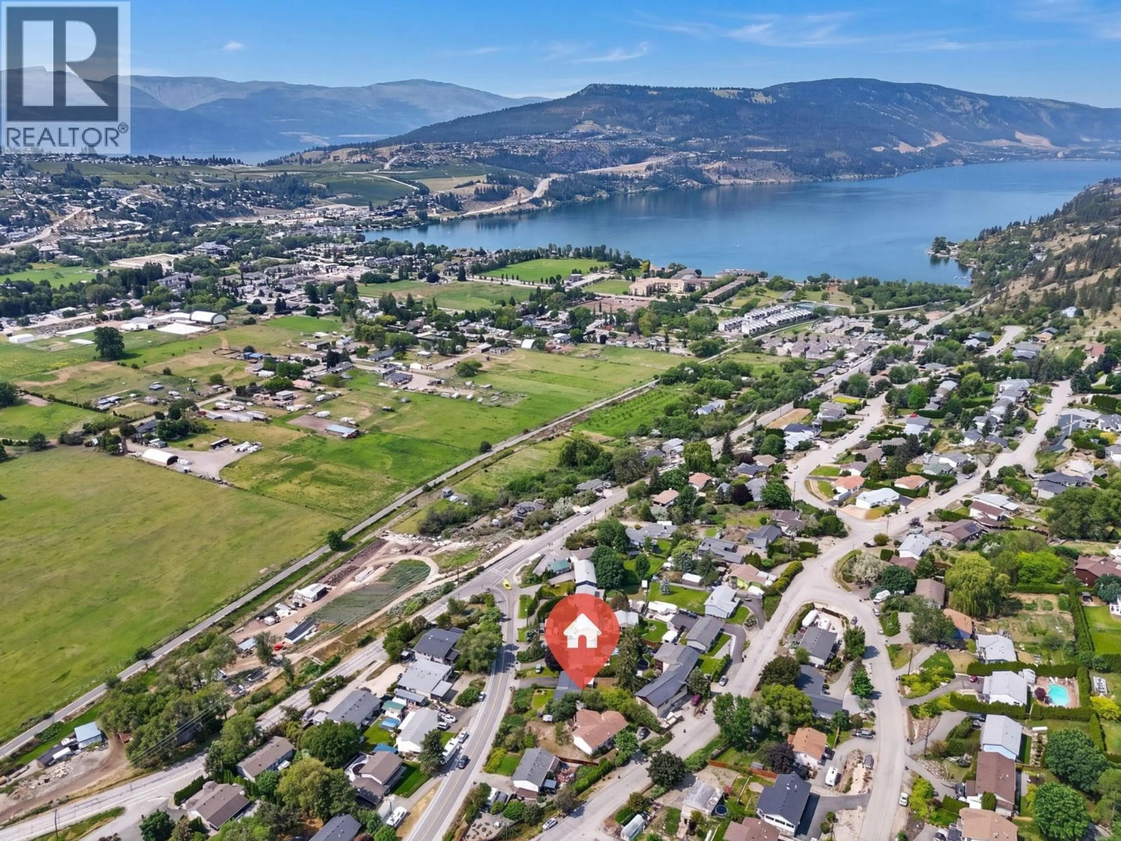 A pic from outside/outdoor area/front of a property/back of a property/a pic from drone, water/lake/river/ocean view for 10911 SHERMAN DRIVE, Lake Country British Columbia V4V1W8