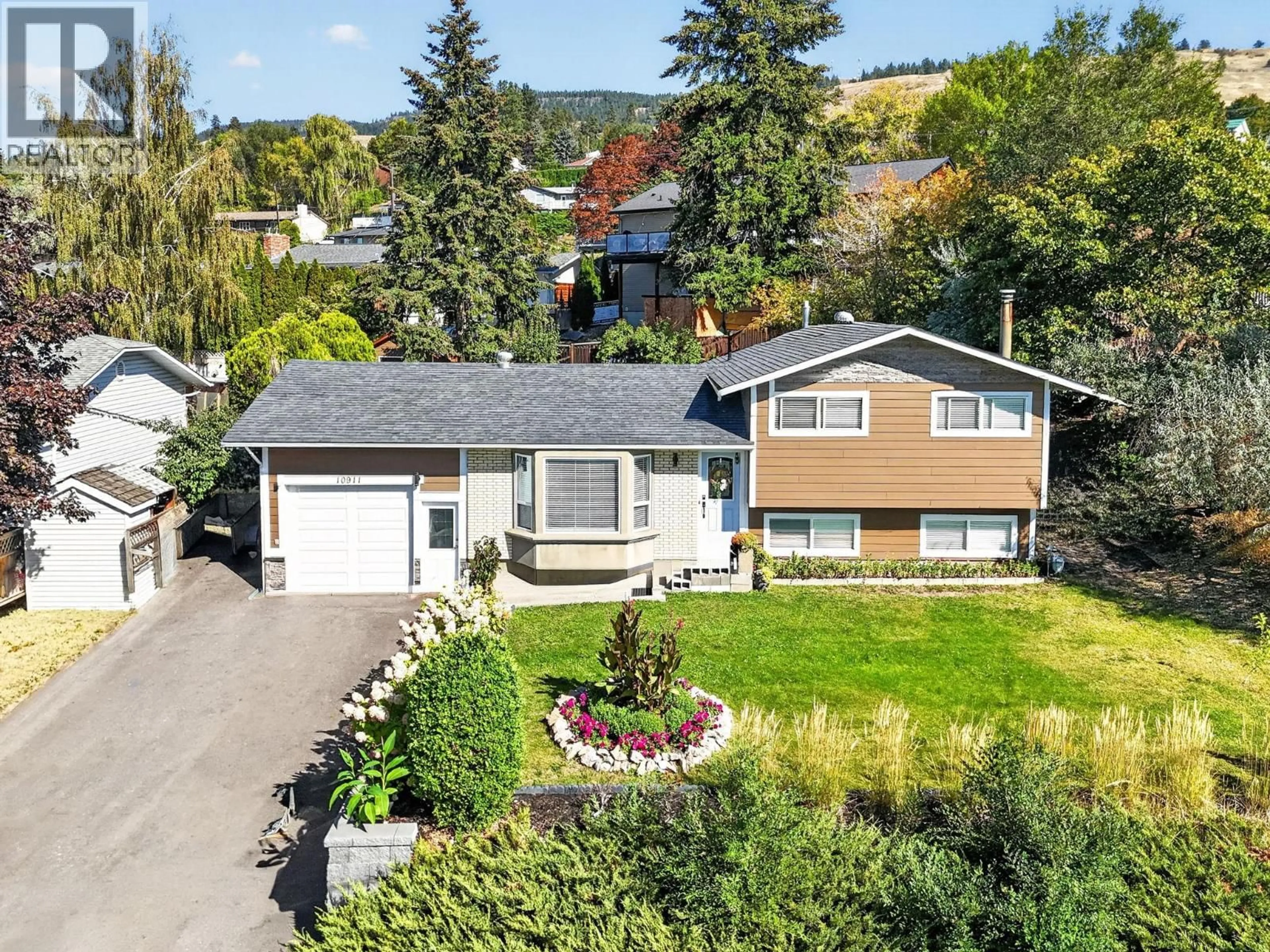 A pic from outside/outdoor area/front of a property/back of a property/a pic from drone, street for 10911 SHERMAN DRIVE, Lake Country British Columbia V4V1W8
