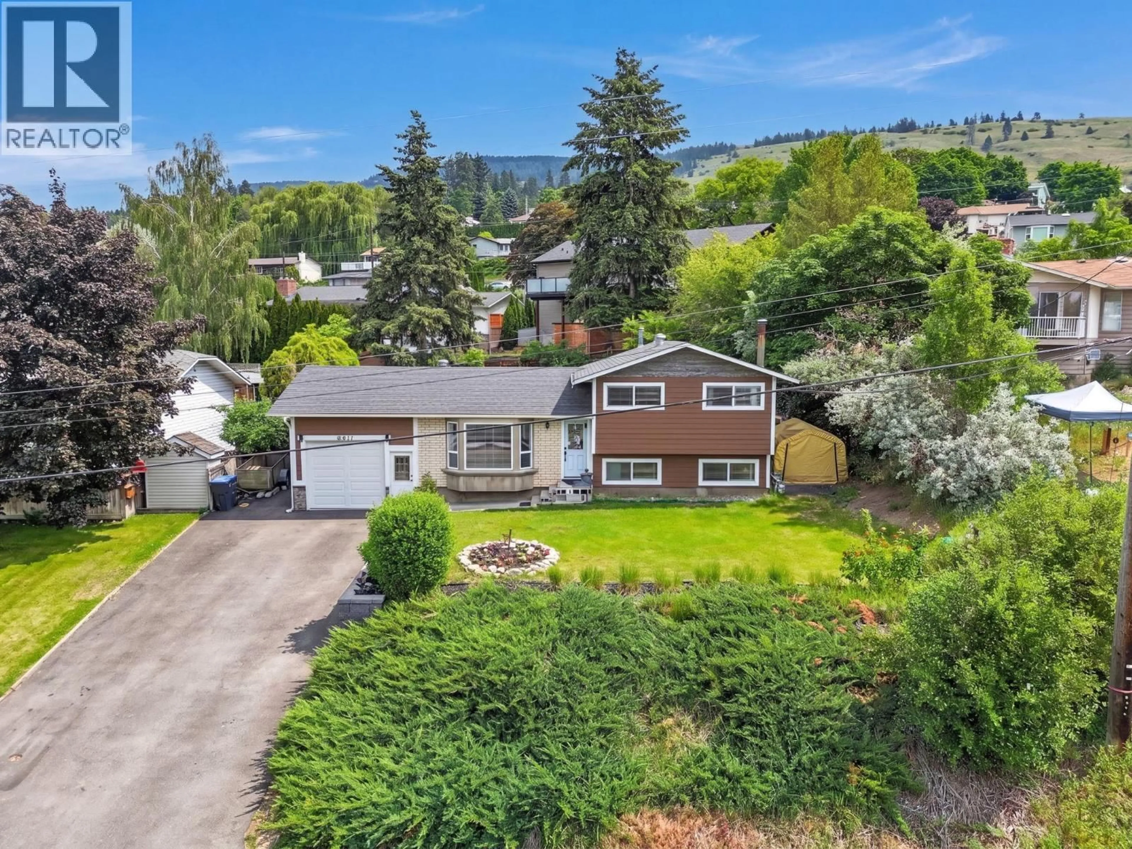 A pic from outside/outdoor area/front of a property/back of a property/a pic from drone, street for 10911 SHERMAN DRIVE, Lake Country British Columbia V4V1W8