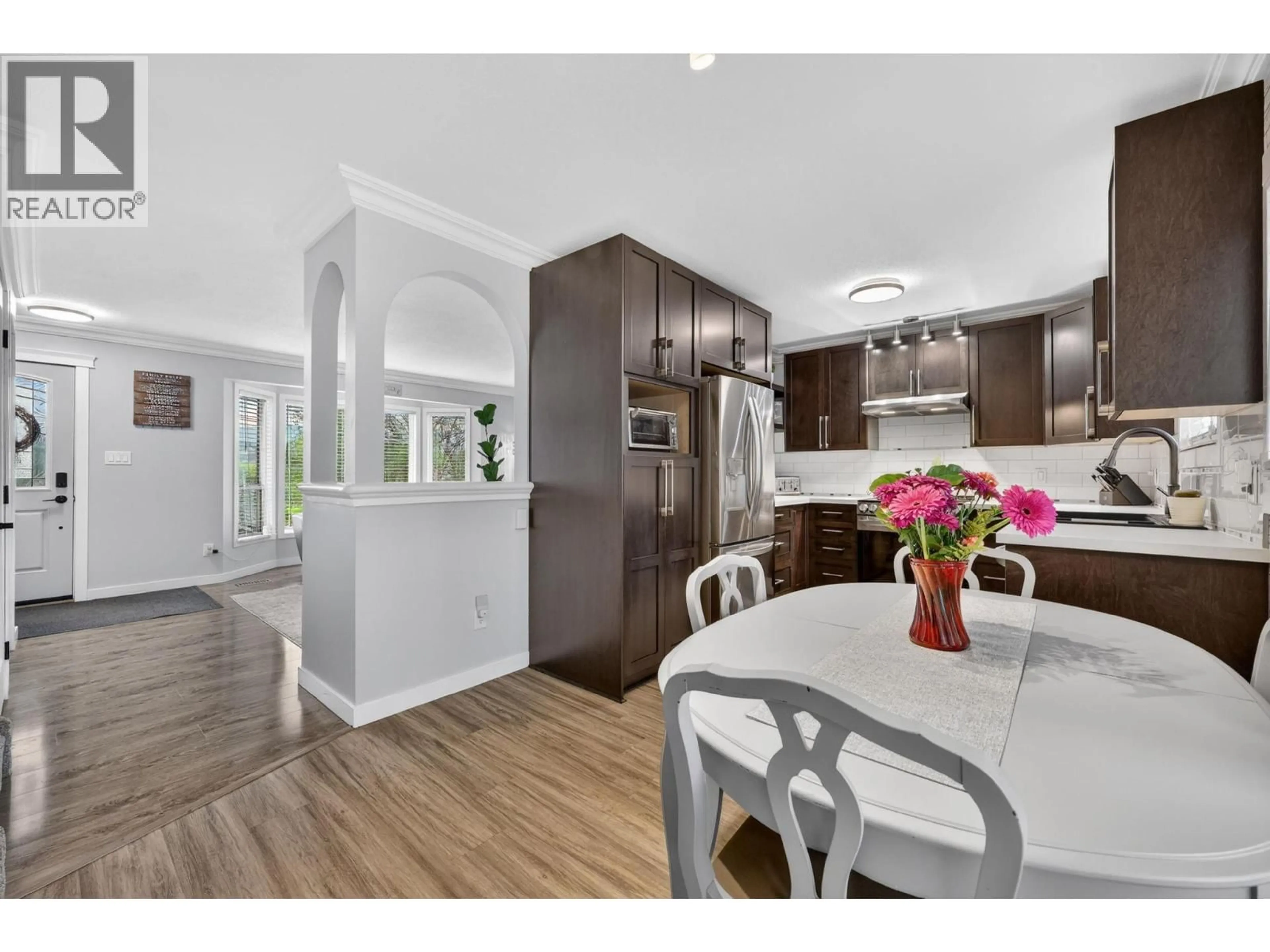 Open concept kitchen, wood/laminate floor for 10911 SHERMAN DRIVE, Lake Country British Columbia V4V1W8
