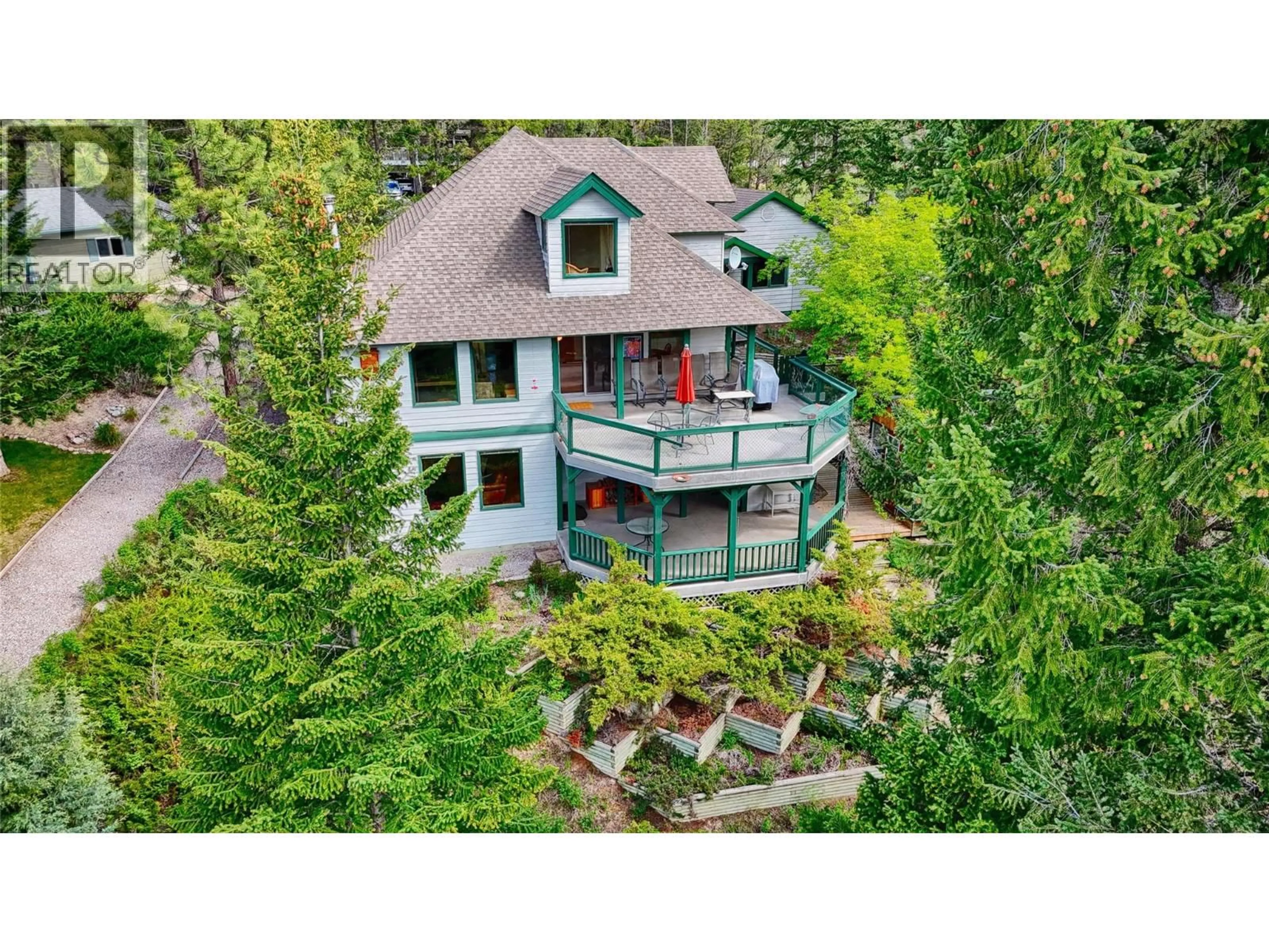 A pic from outside/outdoor area/front of a property/back of a property/a pic from drone, water/lake/river/ocean view for 1067 TIMBERHILL PLACE, Windermere British Columbia V0A1K3