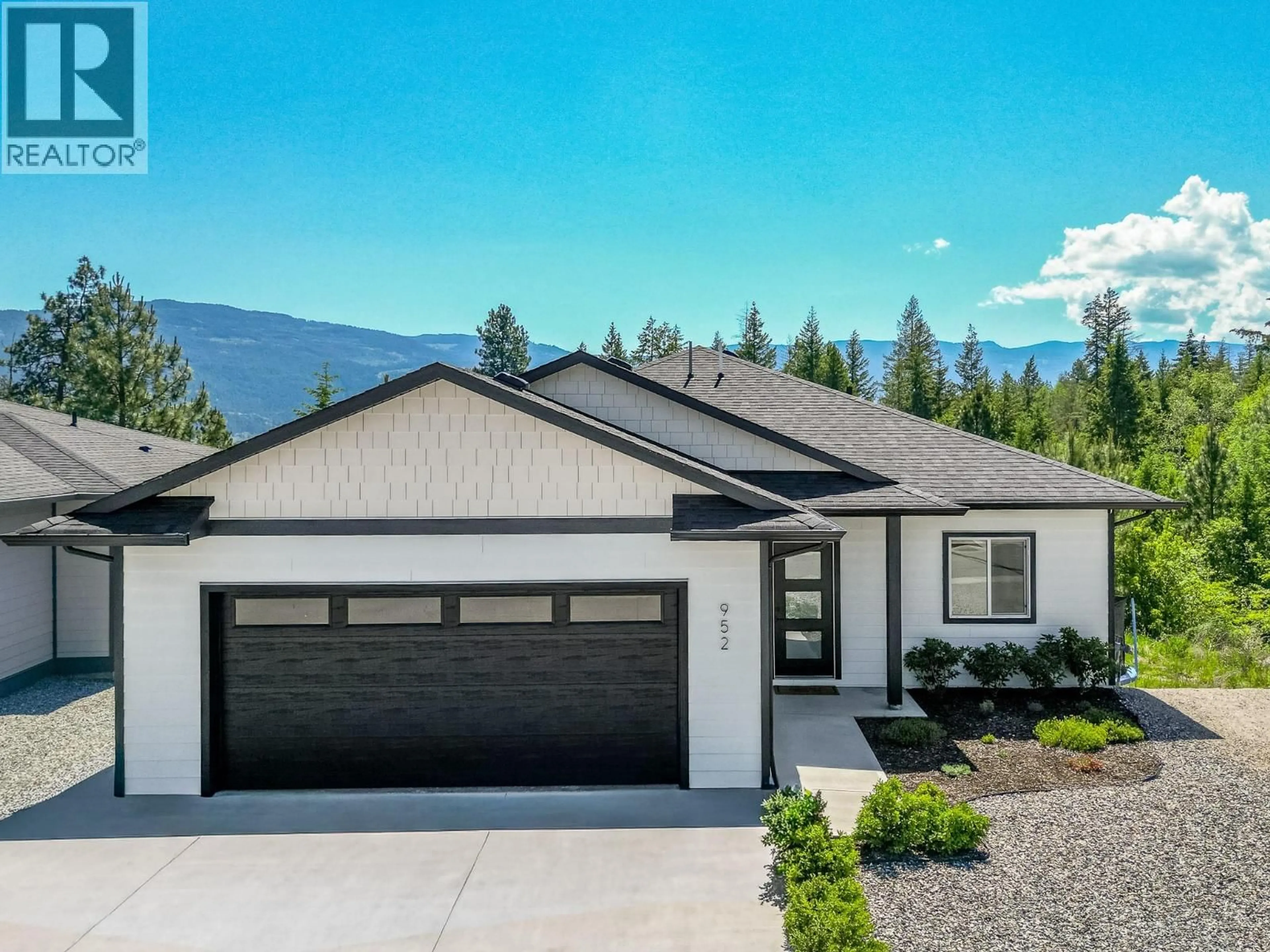 Home with vinyl exterior material, mountain view for 952 RIDGEWOOD DRIVE, Enderby British Columbia V0E1V1