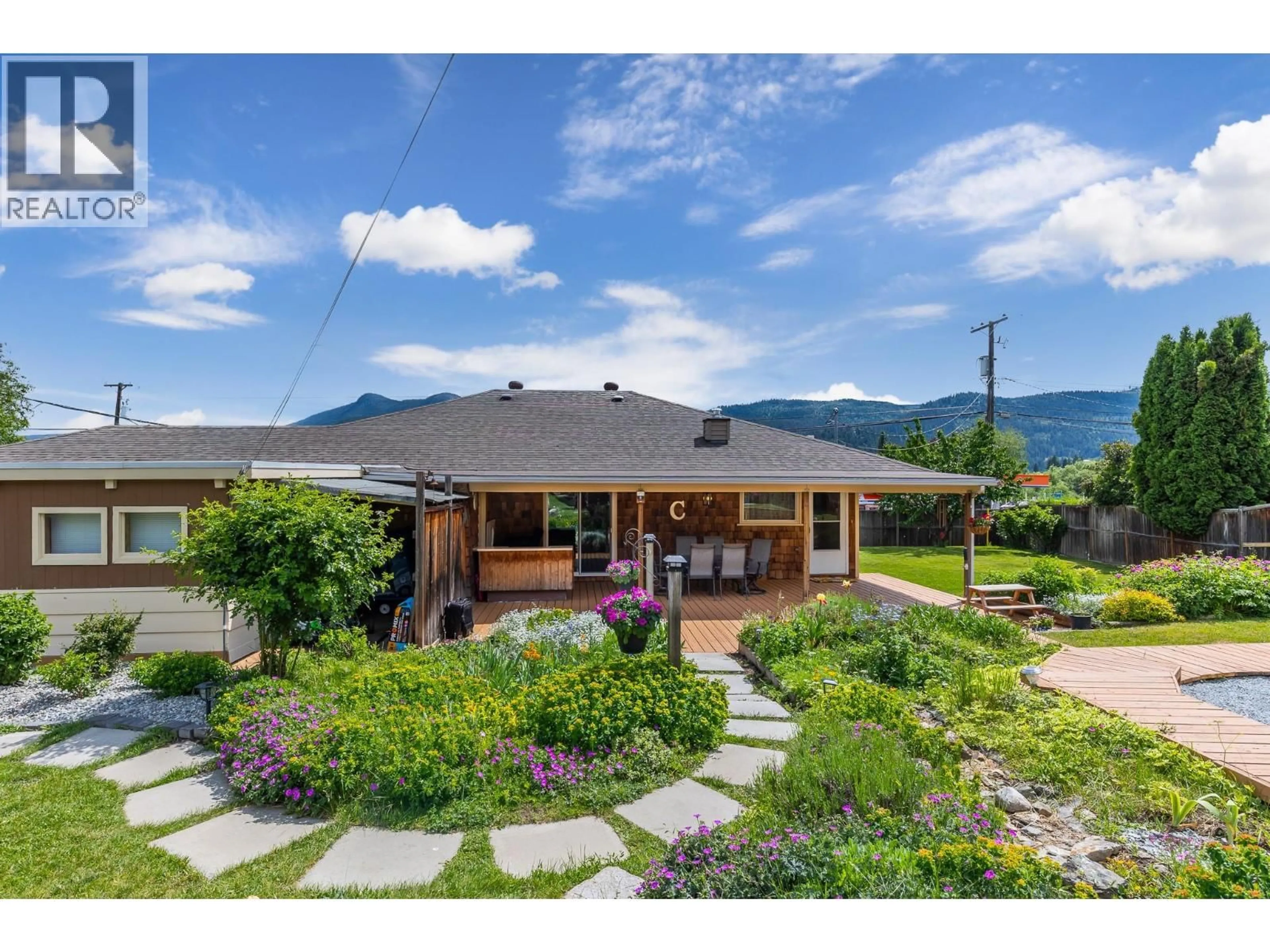 A pic from outside/outdoor area/front of a property/back of a property/a pic from drone, mountain view for 6310 FREEMAN DRIVE, Coldstream British Columbia V1B3C7