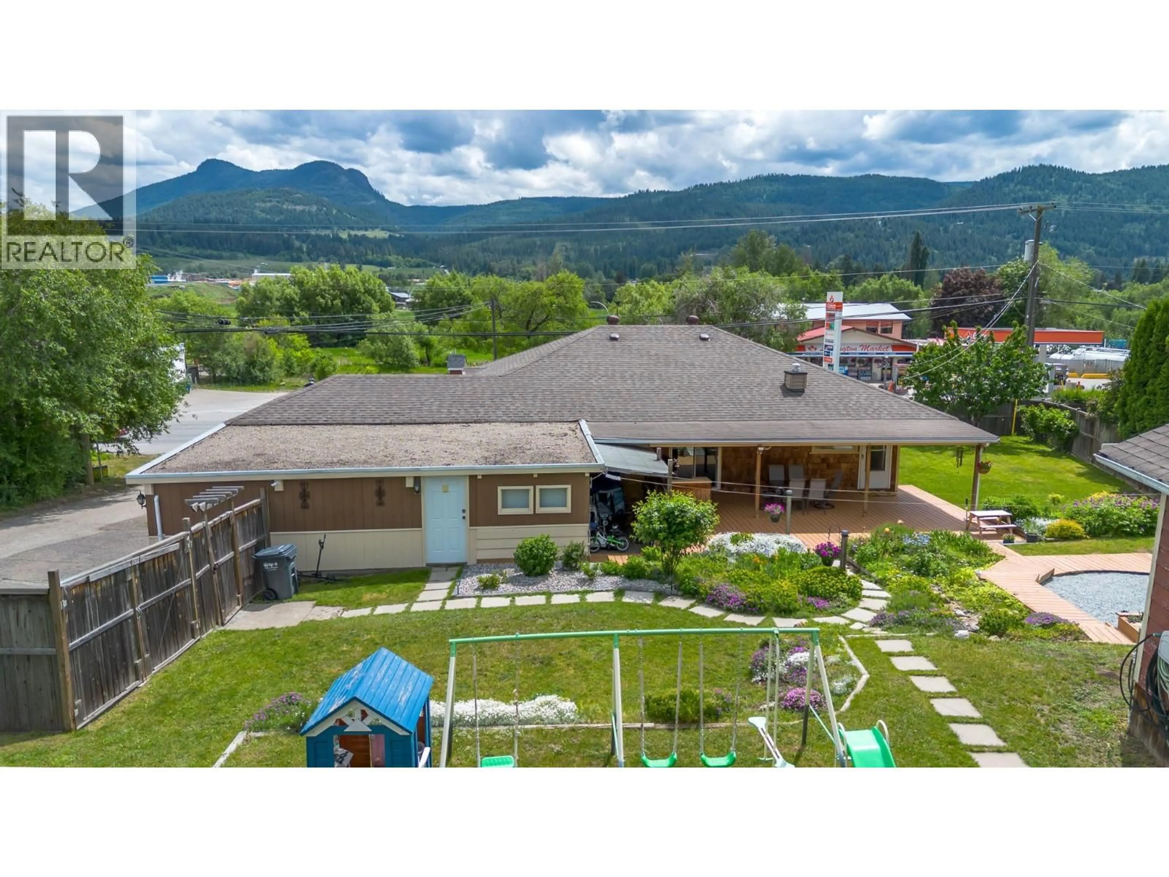 A pic from outside/outdoor area/front of a property/back of a property/a pic from drone, mountain view for 6310 FREEMAN DRIVE, Coldstream British Columbia V1B3C7