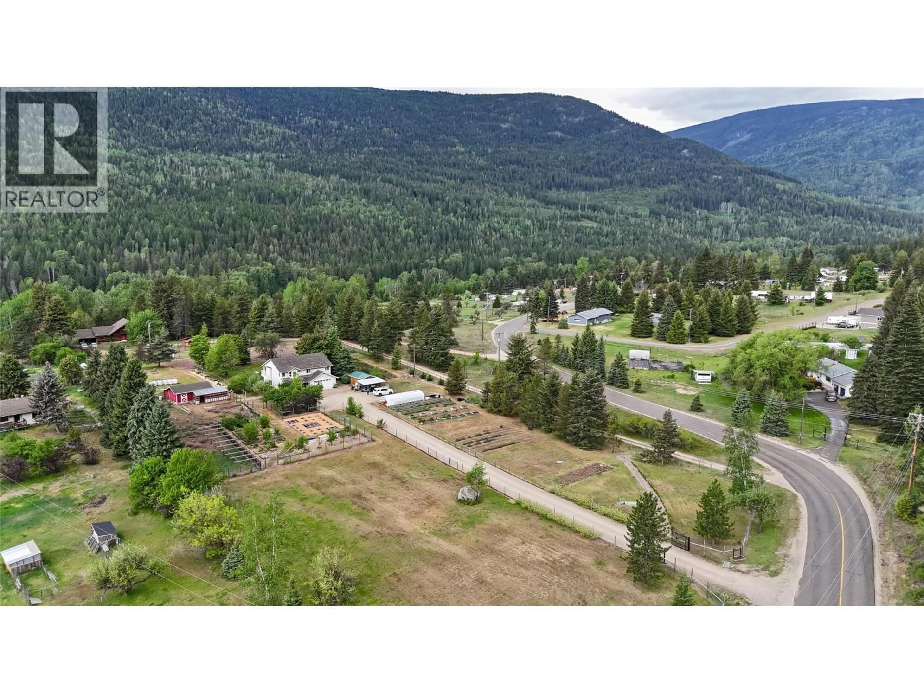 A pic from outside/outdoor area/front of a property/back of a property/a pic from drone, mountain view for 1958 PASS CREEK ROAD, Castlegar British Columbia V1N4S8