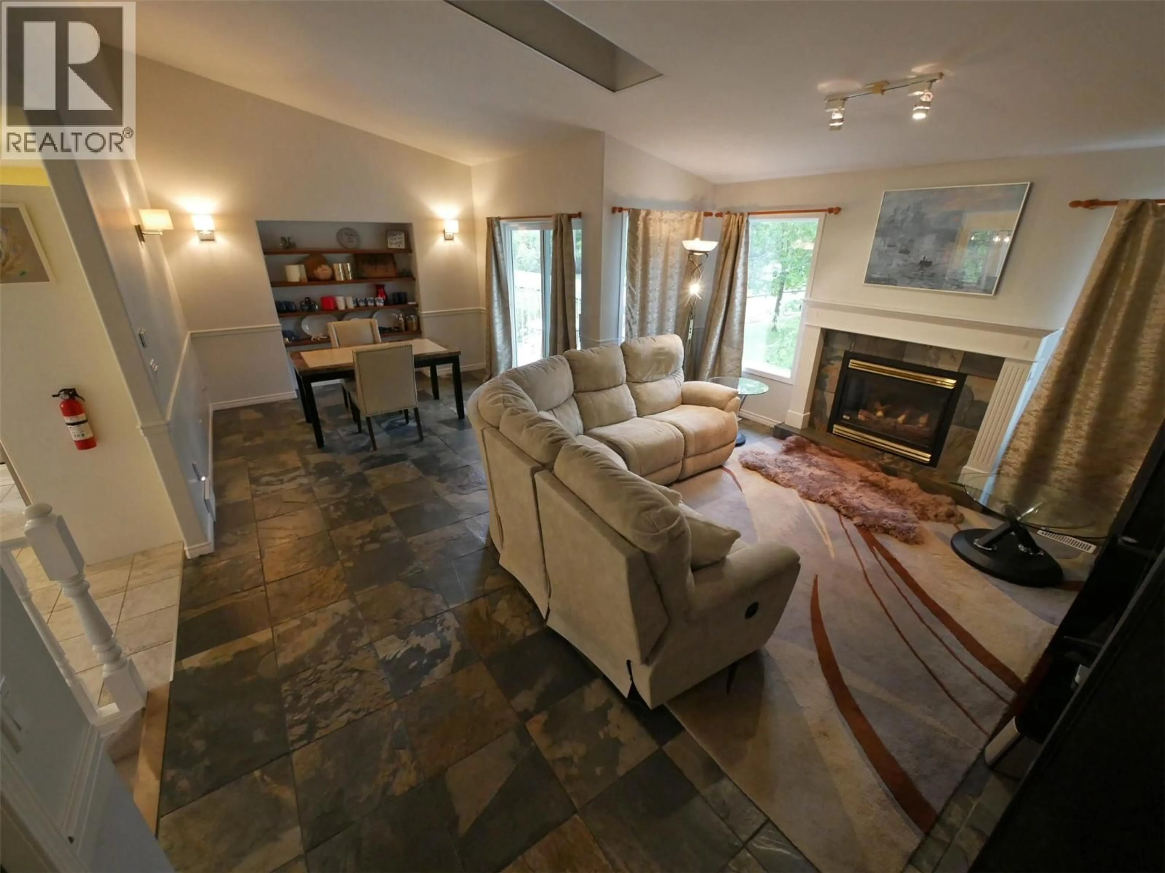 Living room with furniture, ceramic/tile floor for 1958 PASS CREEK ROAD, Castlegar British Columbia V1N4S8