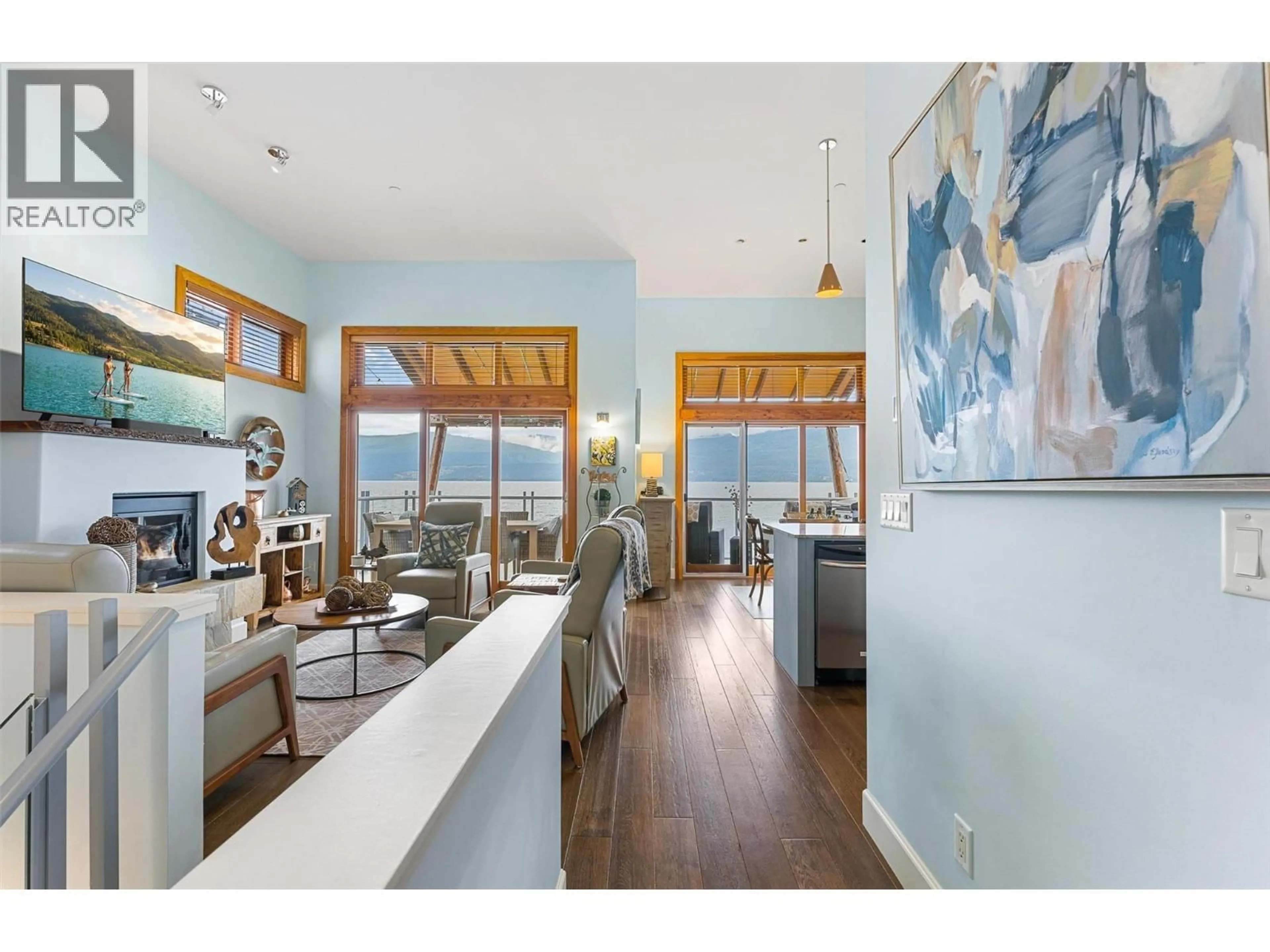 Open concept kitchen, wood/laminate floor for 28 - 9845 EASTSIDE ROAD, Vernon British Columbia V1H1Z2