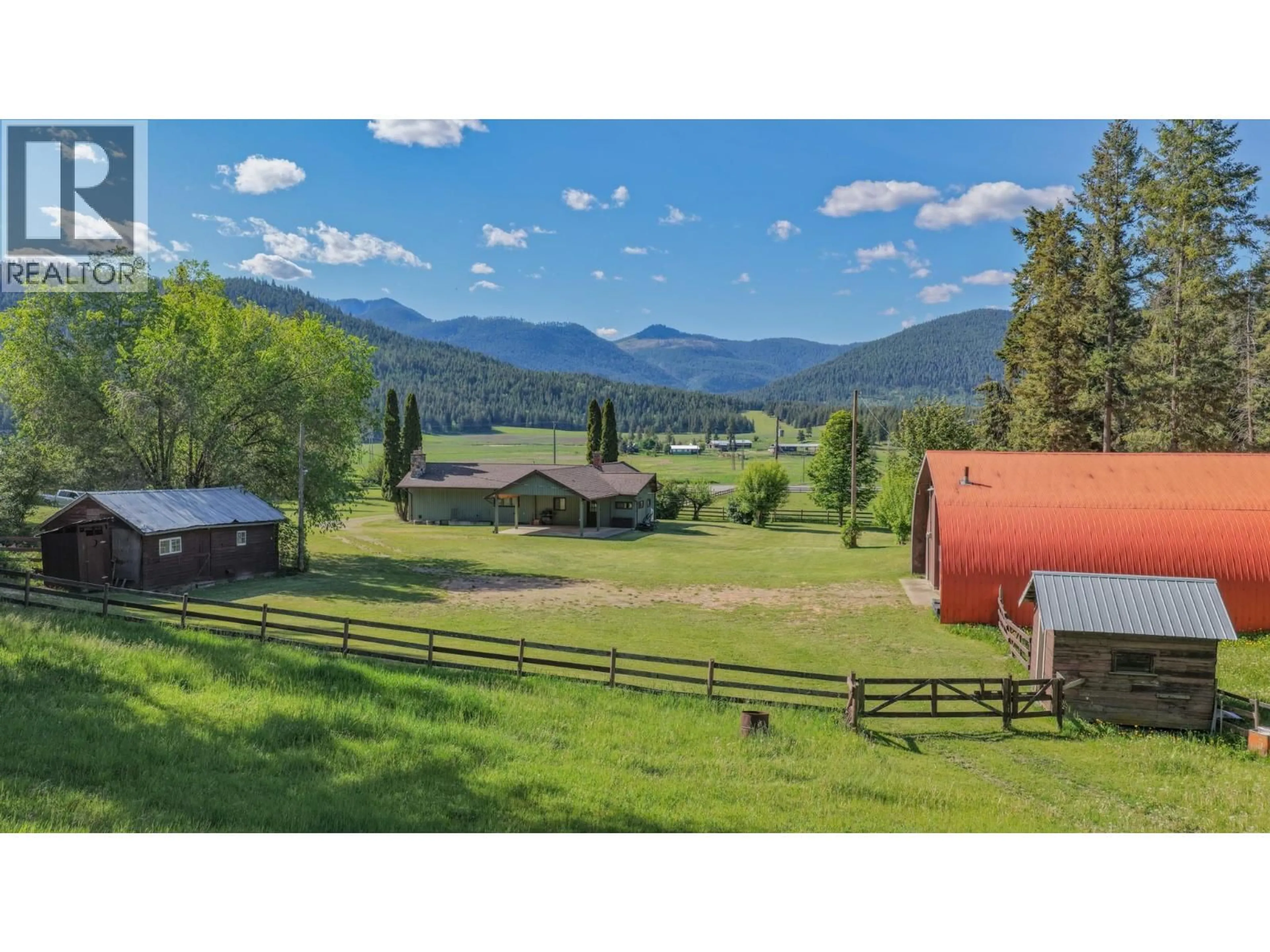 A pic from outside/outdoor area/front of a property/back of a property/a pic from drone, mountain view for 2471 6 HIGHWAY, Lumby British Columbia V0E2G1